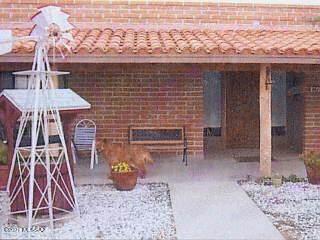 Gorgeous SW Style Home with wonderful views.  Custom fixtures, Cabinets and Fans.