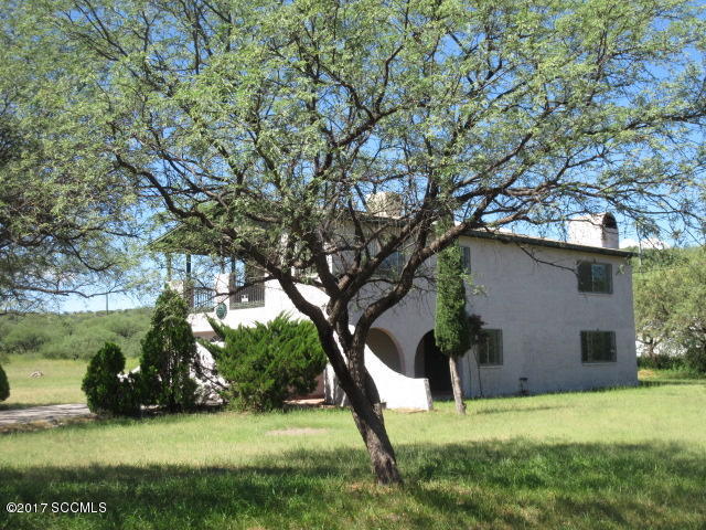 This home features a entry way that leads to the living room with fireplace. Large kitchen with dinning area and breakfast bar. Upstairs gives way to 2 bedrooms, one has a play area, both have doors to the balcony. Master bedroom has a fireplace and private balcony. 2 car garage, large yard.
