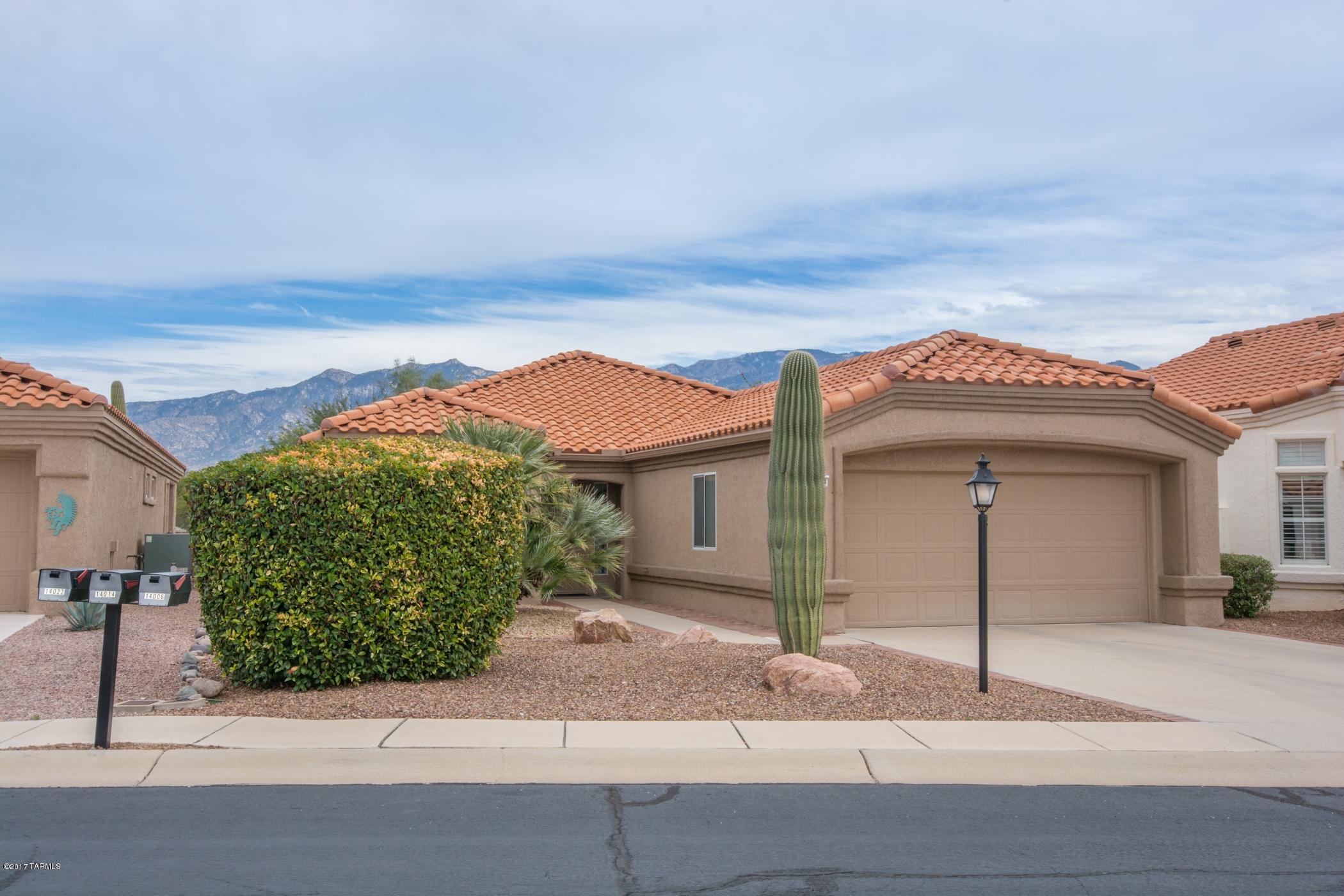 Welcome to Sun City, Oro Valley...Very popular Mariposa Model, 2 bedroom, 2 bath, 1190 sq.ft...Updated kitchen cabinets, gas stove, granite countertops and open floor plan. New Sun City paint scheme, low care landscape, extended brick back patio and sweeping Mountain Views.