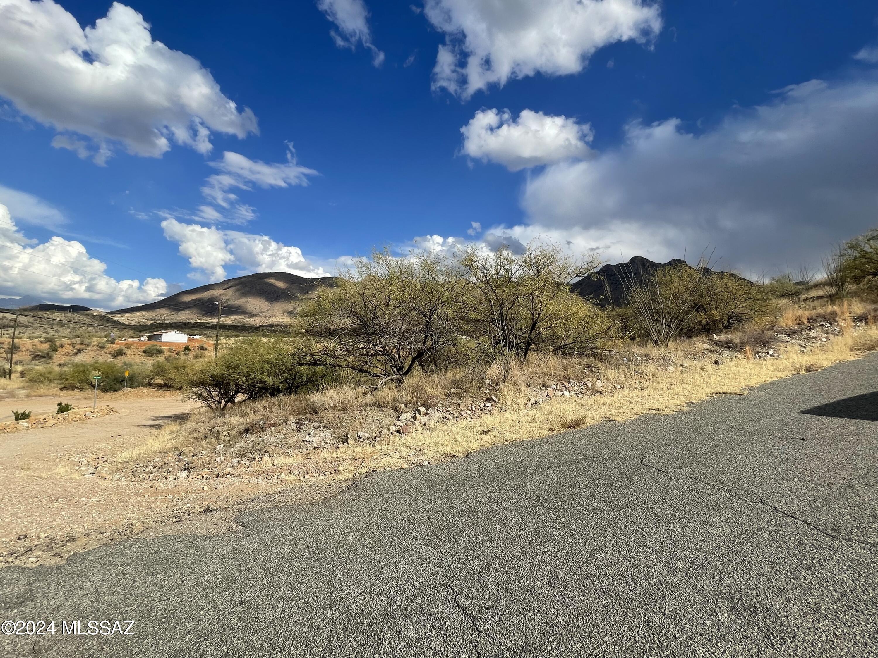 Build your home on this .77 acre lot surrounded by great views of the nearby mountains.  Electricity poles and water are nearby.  Just minutes away from shopping and restaurants. Easy access to the freeway.