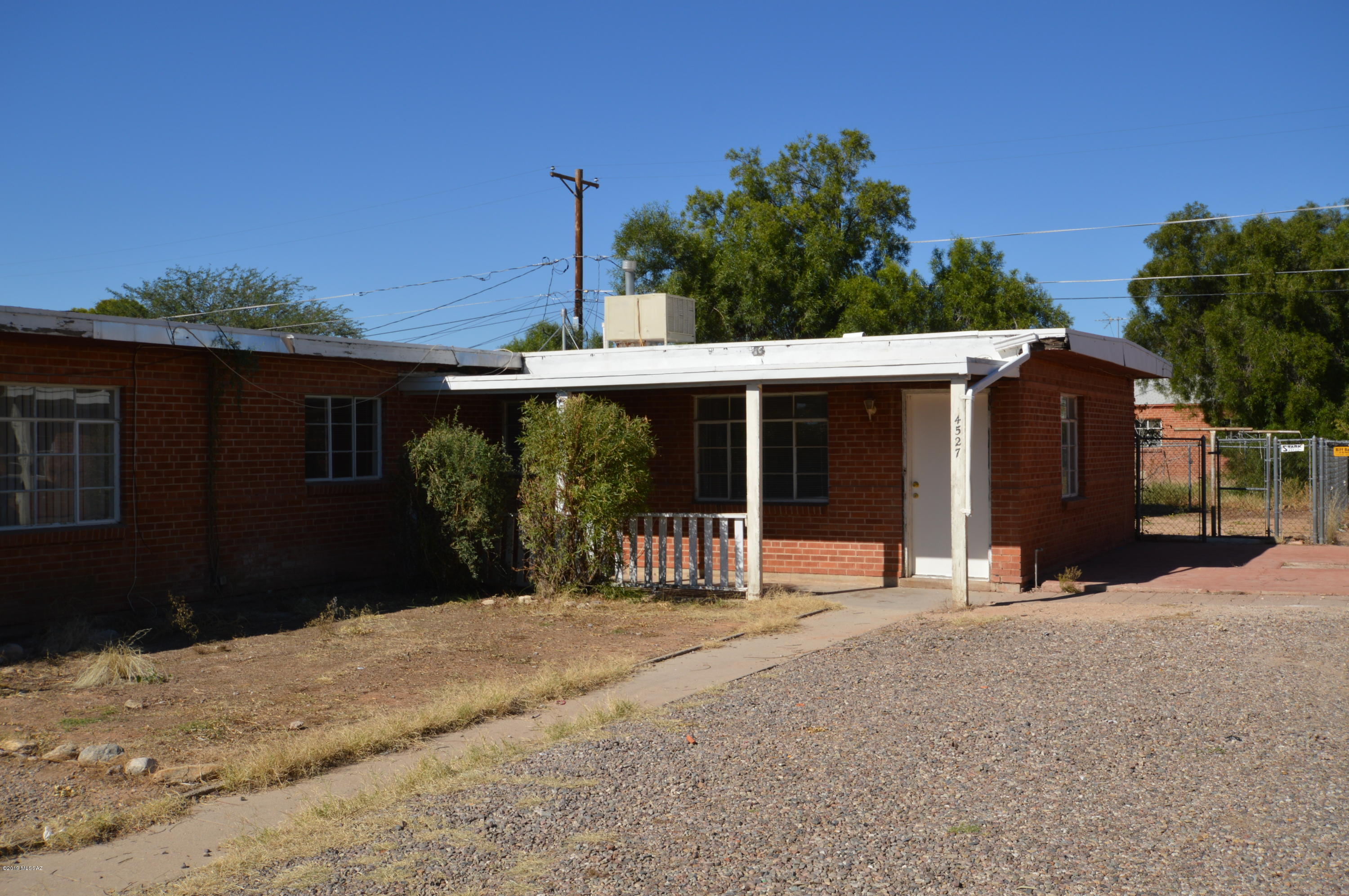 Great Brick 3 Bedroom 1 bath duplex unit. HUGE fenced back yard. Big living area and bedrooms. Detached carport with additional storage. Master Cool and gas heat. Great location, easy access to everything. Approved pet welcomed with deposit. Great affordable family home.