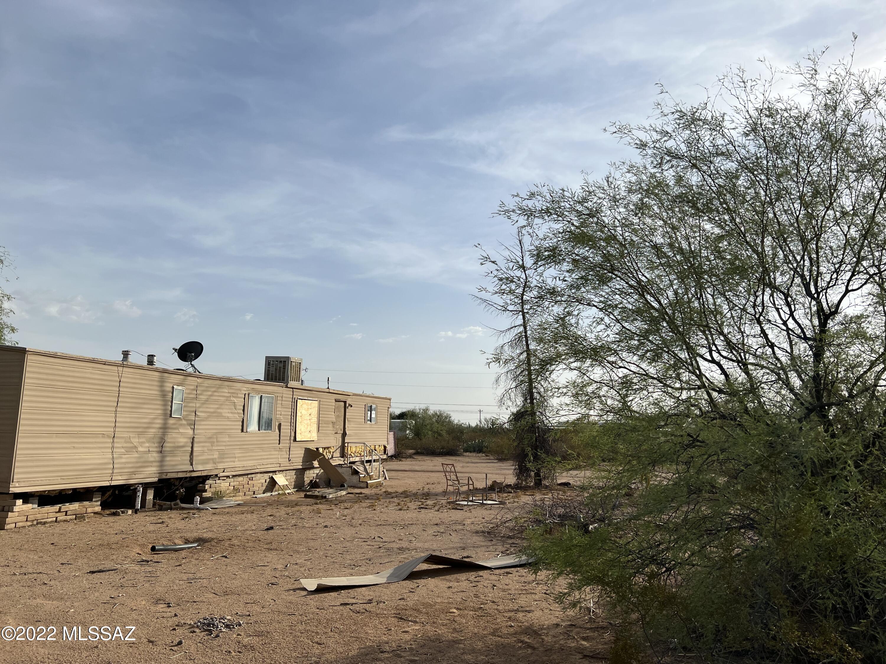 Great 1 acre property. All utilities located on the property. Ready for your dream home. Inhabitable trailer and personal property to convey with the sale and sold as is. Seller is related to listing agent.