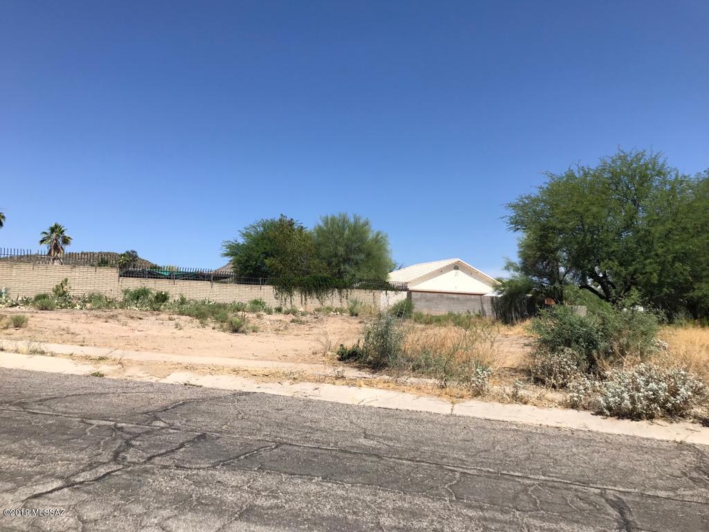 Great opportunity to own on of the few lots available in West Tucson! This lot is located very close to Pima Community College West campus and in a very nice and well established neighborhood. Convenient location close to downtown, I-10, St. Mary's Hospital, and major employers. Upcoming area with tons of potential for appreciation!!