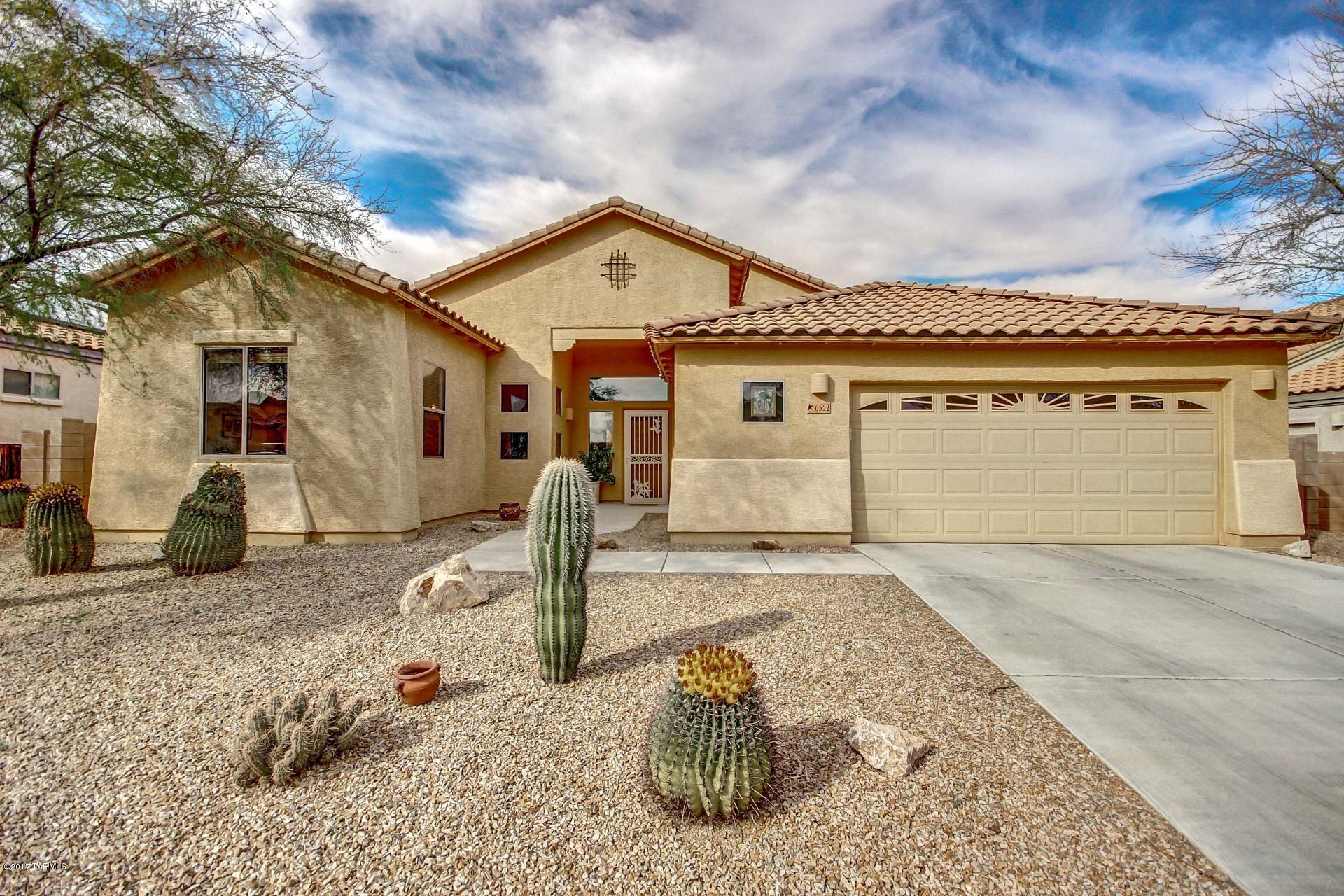 Come and experience the beauty of open desert living. The unencumbered mountain views and brilliant sunsets will bring peace and serenity in this open concept layout! Situated on a larger lot the home features a great room with split bedroom floor plan, indoor and outdoor entertainment areas, stainless steel appliances and large picture windows inviting you to enjoy the free form, solar and electric heated pool, spa, outdoor kitchen and fire pit in your private backyard. The low maintenance landscaping will give you the time to relax with all this home has to offer you! The large master suite includes 2 large walk in closets, soaking tub and long double sink vanity. The upgraded kitchen cabinets have pull out shelving. Plus an over sized garage with workbench and shelving for the hobbyist. There's a community dog park, picnic areas, park with great play areas, restrooms, basketball court. Academy Del Sol Charter School is located in community  It's all here waiting for you!