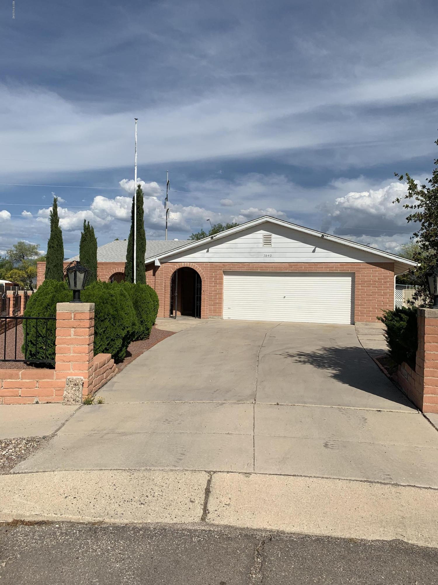 This one-owner, well-maintained home is just waiting for you to make your own.  Perfect for your family, the home boasts a front courtyard, generous living room with fireplace, a family room, a kitchen with breakfast bar, 4 bedrooms and 2 bathrooms.  Plenty of storage all throughout the home, including the garage with laundry.  Entertain on the large covered patio and covered ramada in the backyard.  Washer and dryer included, plus electric range, fridge and dishwasher.  Kitchen sink has a boiling water dispenser for quick cups of coffee or tea.  Rolling shutters for added security/shade from the western sun. Roof warranty conveys at closing.  This is a gem, don't miss it!