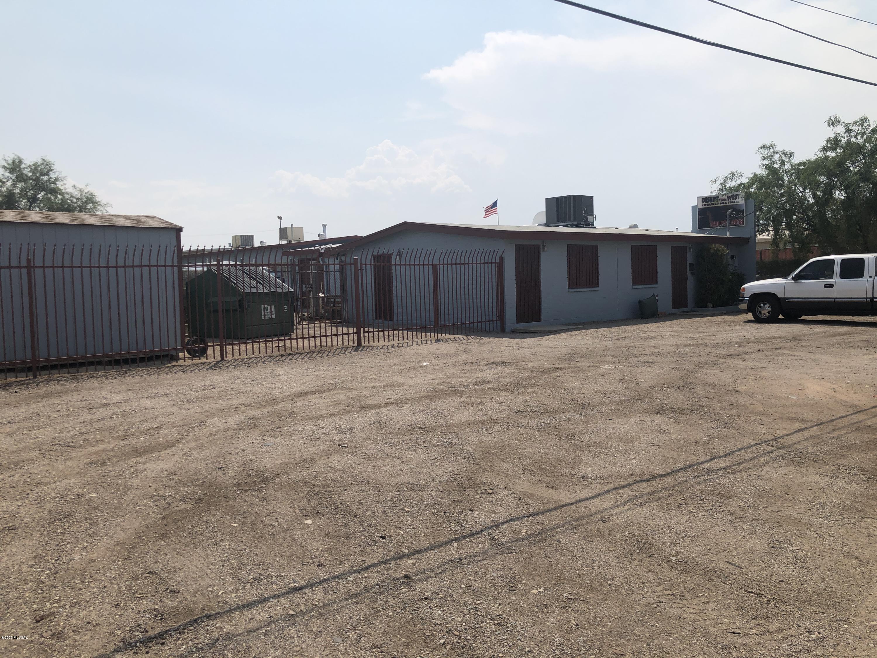 EXCELLENT LOCATION FOR A SERVICE OR FABRICATING BUSINESS. WELL LOCATED AND REASONABLY PRICED INDUSTRIAL FLEX WITH FENCED YARD.  INCLUDES APPROX. 1300 SQ/FT OFFICE W/ KITCHENETTE & W/ AC AND APPROX. 2200 SQ/FT SHOP WORK AREA W/ EVAP & FURNACE.  FULLY FENCED YARD WITH ACCESS GATE INCLUDES 8' X 8' X 40' STORAGE CONTAINER AND 2-STORAGE SHEDS.  PROPERTY INCLUDES 2-PARCELS, 132-06-0810, 132-06-0820. 4-ROLL UP DOORS ON SHOP.  200A, 240V, SINGLE PHASE POWER.  ON SEPTIC SYSTEM.