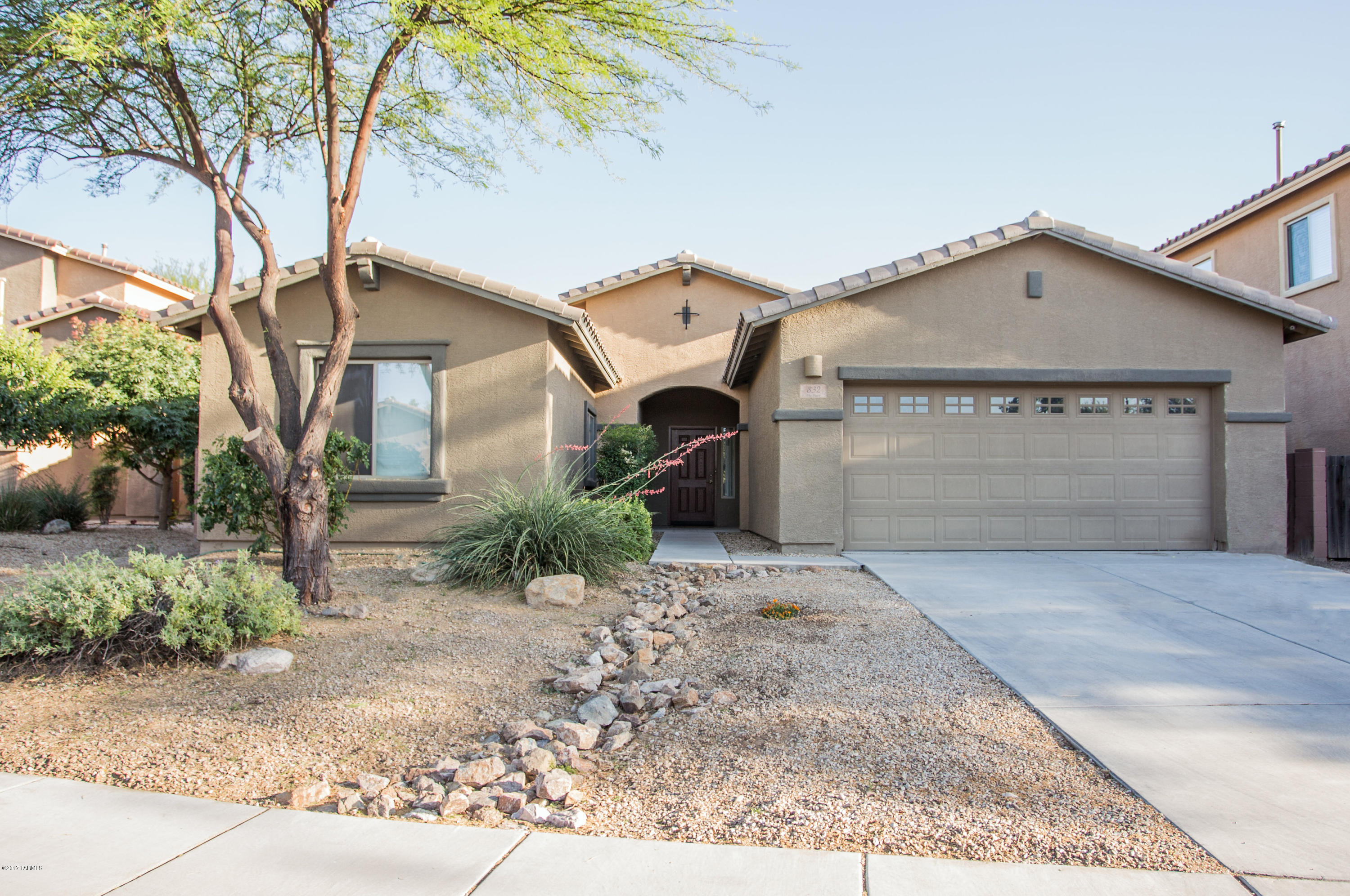 THIS OPEN FLOOR PLAN IS A 4 BEDROOM, 2 BATH HOME IS HUGE & OPEN! PRICED RIGHT!UPGRADED KITCHEN CABINETS WITH GRANITE. THE BACKYARD IS IDEAL FOR ENTERTAINING LARGE GROUPS OF FRIENDS & FAMILY. LOCATED IN A QUITE NEIGHBORHOOD FILLED WITH LOTS OF FAMILIES AND COMMUNITY PARK AND POOL TO ENJOY. CLOSE TO SHOPPING AND I-19. HOME HAS SOME HANDICAP FEATURES.