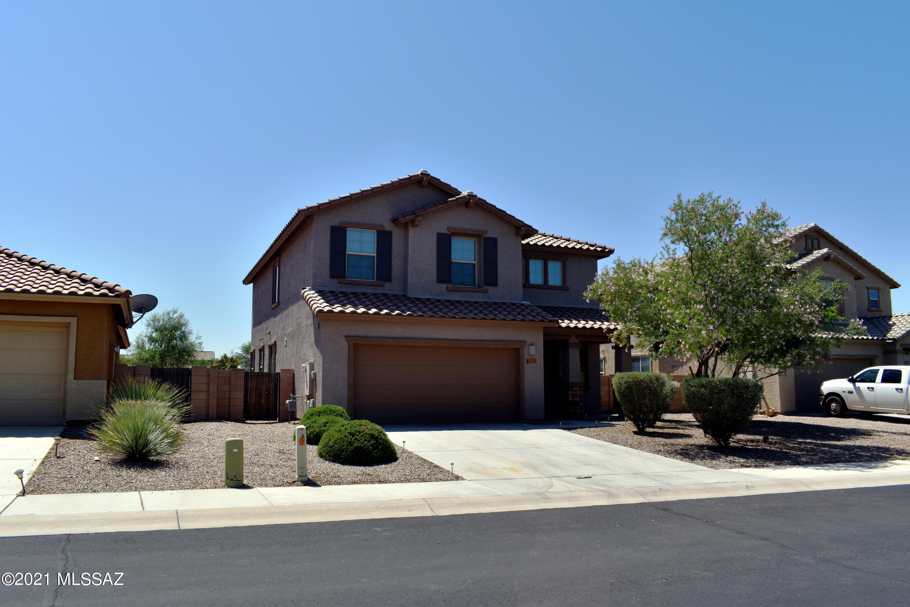 Large family home with 5 bedrooms and 3 full bathrooms. Featuring granite counters and a backsplash in a beautiful kitchen. Wonderful landscaping with an artificial grass lawn in the back. One full bathroom and a bedroom are down stairs. The master, other bedrooms, and two full bathrooms upstairs. Spacious loft and downstairs living areas. 5th bedroom not pictured.
