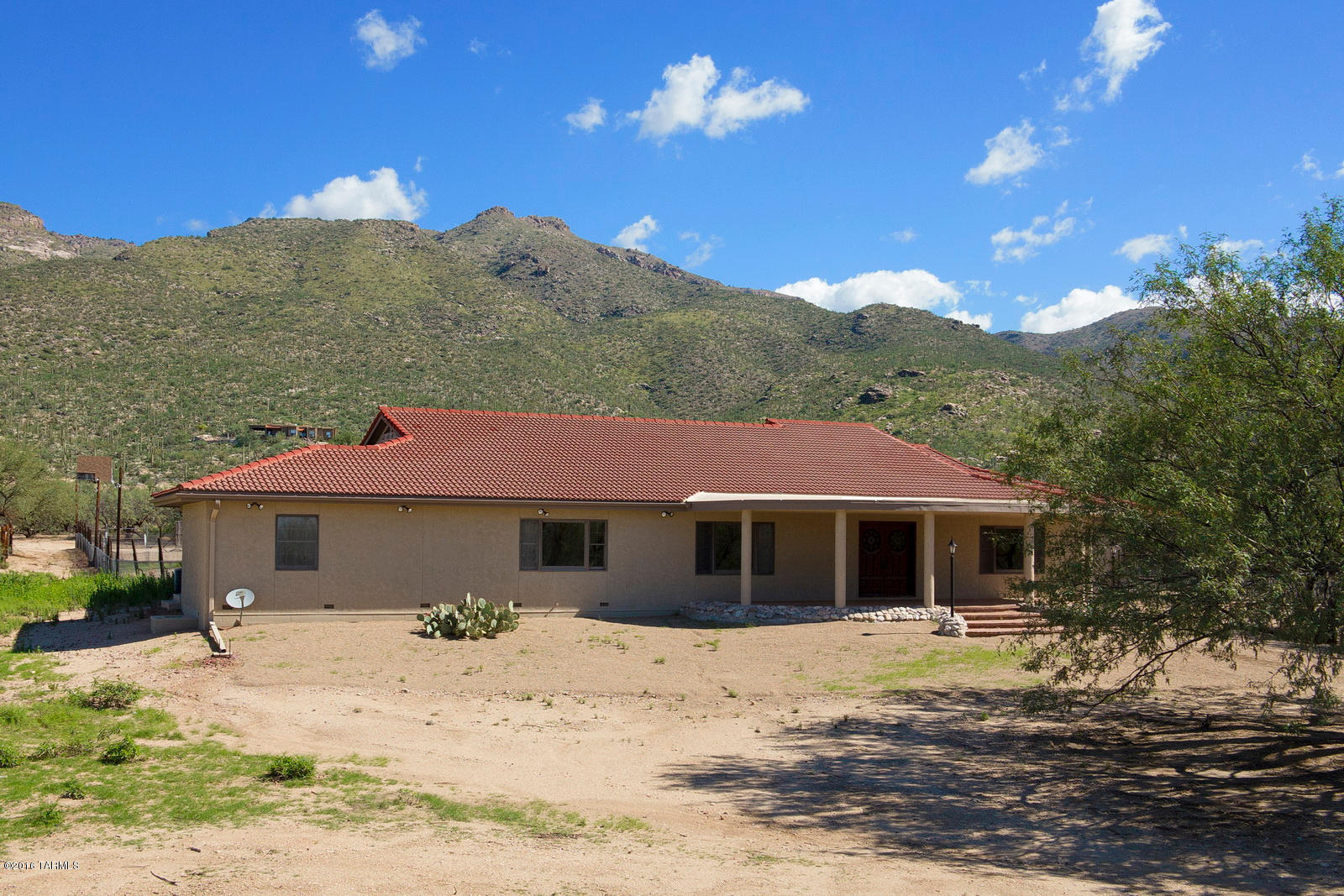 Fabulous 4BR/3BA, 4669 Sq. Ft. Custom Ranch House w/Horse Barn on 8 Acres. Very Private & Secluded yet Close-in for Easy Access to Shopping & Services. The Home Boasts a Large Country-Style Kitchen, Butler’s Pantry, Formal Living & Dining Rooms, Family Room w/Wood-Burning Fireplace, & an Office/Hobby Rm. This is an Ideal Equestrian Property. Masonry-Constructed 2-Story Barn w/6 Stalls, Tack Room, Storage & Its Own Bathroom/Shower, Plus Corrals, an Arena & Fenced Areas. Sitting at the Base of the Catalina Mountains this Incredible Northeast Tucson Property Offers Spectacular Mountain & Sunset Views. Originally Part of a Nearly 40-Acre Parcel the Newly Created Adjacent Parcels are Also Available for Purchase, if Desired. This Property is Truly a Unique & Rare Find in the Tanque Verde Valle