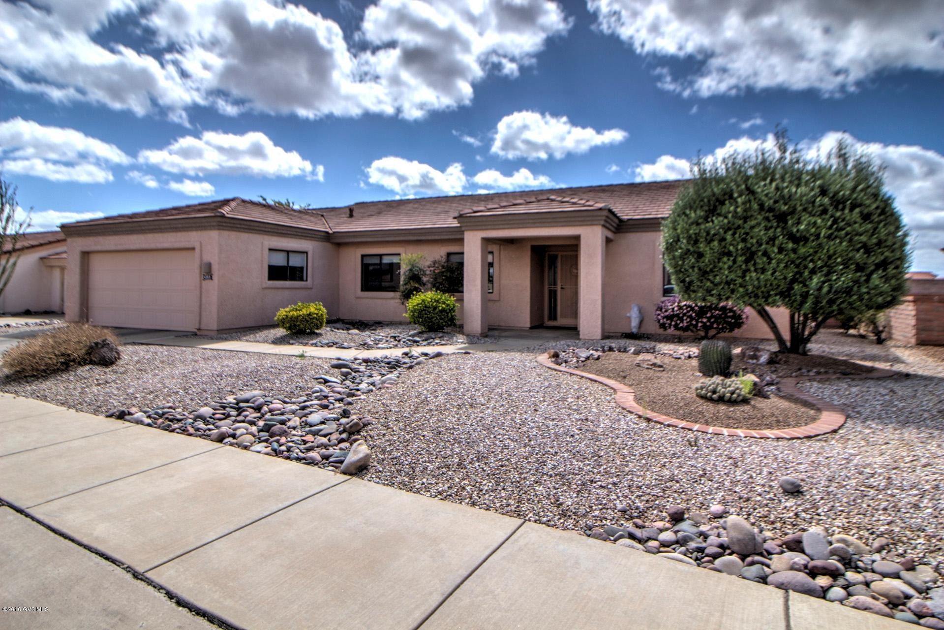 EASIEST MOVE YOU'LL EVER MAKE - Madera model - 1,790 sq ft, 2 BR (2 master suites), 2 Bath. 2 car garage, tile roof, covered porch/patio with nice mountain view. Nicely updated with stainless steel appliances in kitchen, new central air conditioning summer of 2015 and fully furnished. Spotlessly clean - move-in ready. Retire to Green Valley to partake of the activities of 13 recreation facilities, clean air, low crime and friendly folks. It doesn't get any better than this.
