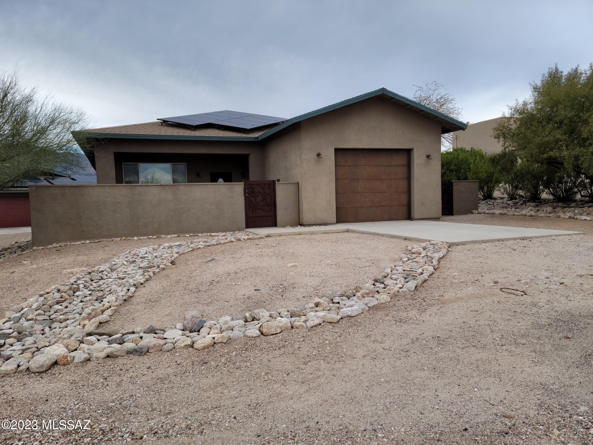 LIKE NEW, SPACIOUS 1 BEDROOM, 2 BATH FULLY FURNISHED HOME WITH GREAT MOUNTAIN VIEWS AND ACCESS TO A WELL LANDSCAPED BACK YARD AND POOL..  HIGH CEILINGS AND OPEN FLOOR PLAN WITH FULL KITCHEN AND LAUNDRY ROOM.  RENT INCLUDES ALL UTILITIES AND TRASH PICKUP.  LARGE COVERED  BACK PATIO AND PRIVATE FRONT PATIO.