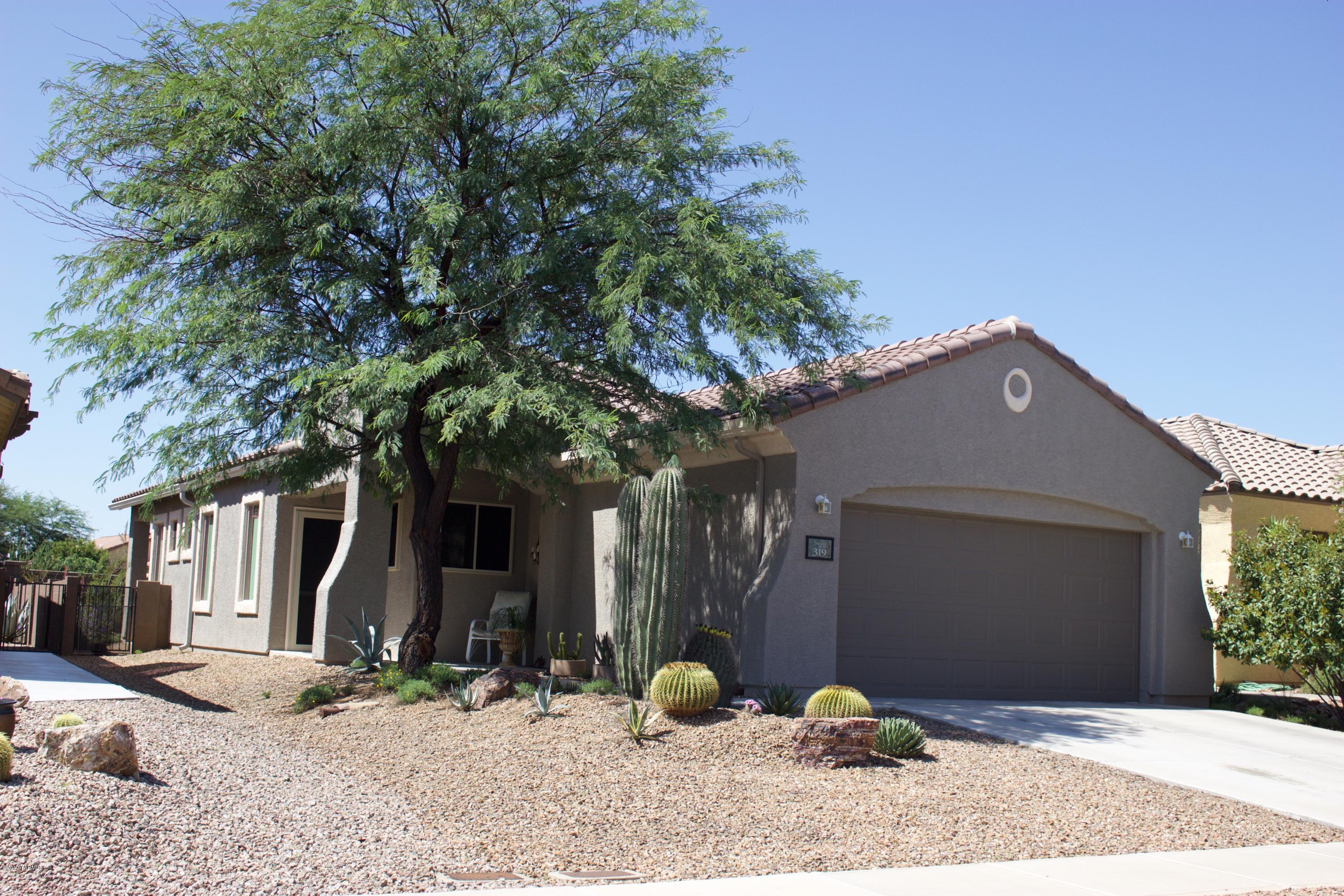Impeccably maintained and generously upgraded home is a must to see! Open floor plan with lots of natural light. Kitchen has corner sink with window, corian counters, eat-in area, gas range and pantry. Master suite has bay window, walk-in closet and generously sized bathroom. Bose wired surround sound included as well as R/O and soft water. Security screens throughout. Handicap accessible, all tile flooring. Newer AC. Master gardener plantings with native growth in extended back yard, backs to common area. Much desired 55-plus community has pool, spa, parks, rec center, bocci ball and much more.  Shows beautifully!
