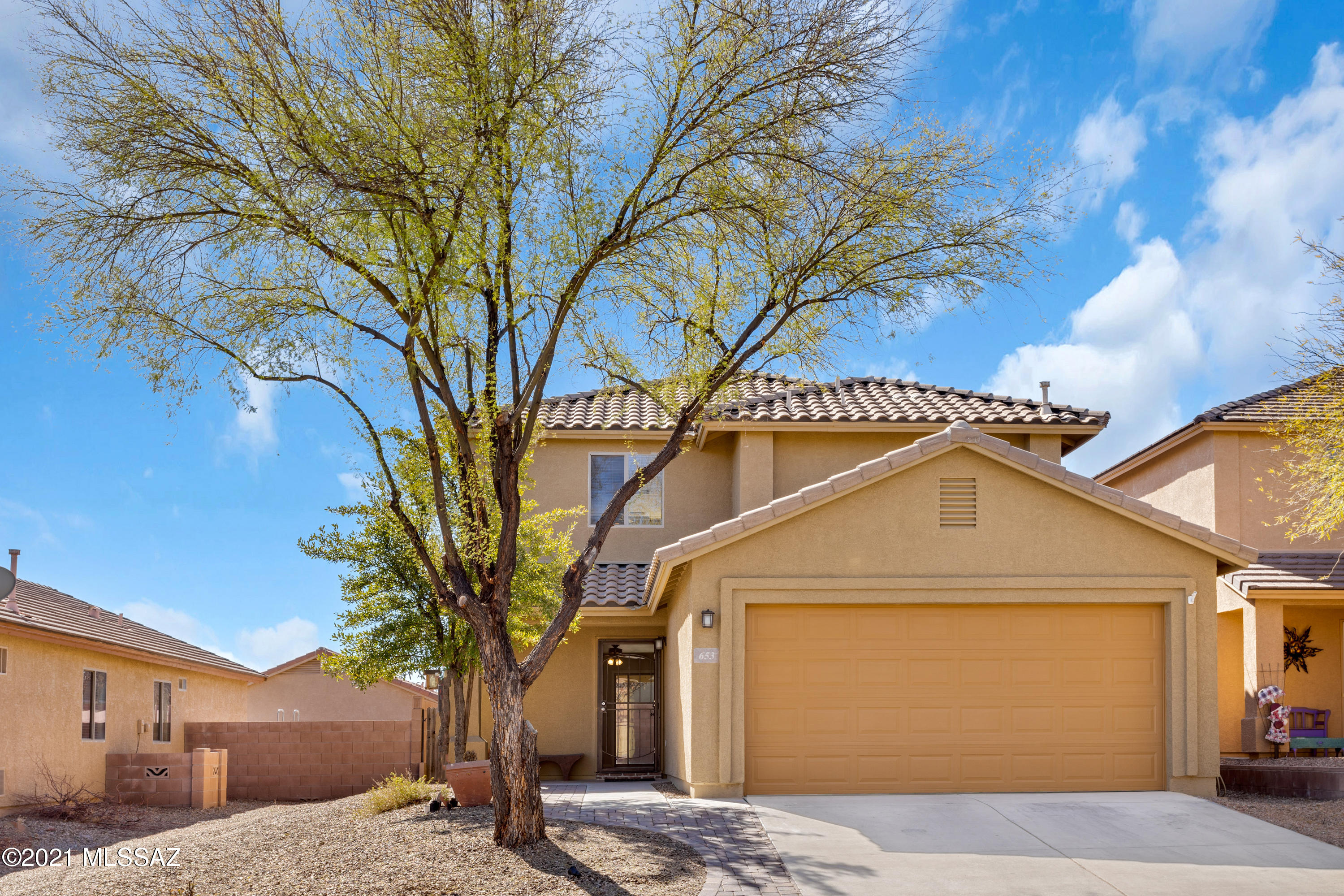 This popular Montery Home floor plan won't be on the market long. Freshly painted exterior and the AC was just replaced in July 2020. You'll love this open plan that features a living space that flows into the dining area and kitchen. Maple cabinets, pantry closet and black appliances including refrigerator are ready for the chef in the family.  The owner's suite is on the main floor and the spare rooms and upstairs along with an oversized loft with magnificent mountain views. Enjoy the generous sized back yard with covered patio and paver extension. Community park includes walking trail, ramadas, BBQs, grass field and basket ball court. Conveniently located minutes to shopping, restaurants and I-19.