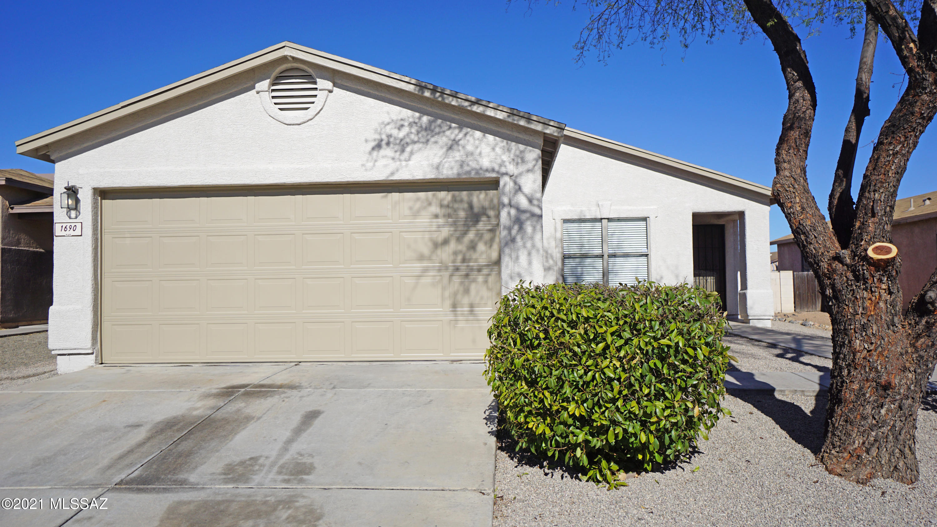 Modern and clean single level home!  3 Bedrooms + Office/4th Bedroom + 2 Bathrooms.  Fantastic open floorplan.  Huge money spent meticulously updating: modern tile, carpet, paint (in/out), cabinetry (quality w/ soft close + plywood boxes), slab granite counters, undermount stainless sink, stainless Whirlpool appliances, gas range, updated lighting, satin door hardware, dual flush toilets, updated bathrooms, wood blinds, garage door opener, landscape rock and more.  Plus 32 solar panels (no contract).  You won't want to miss this home!