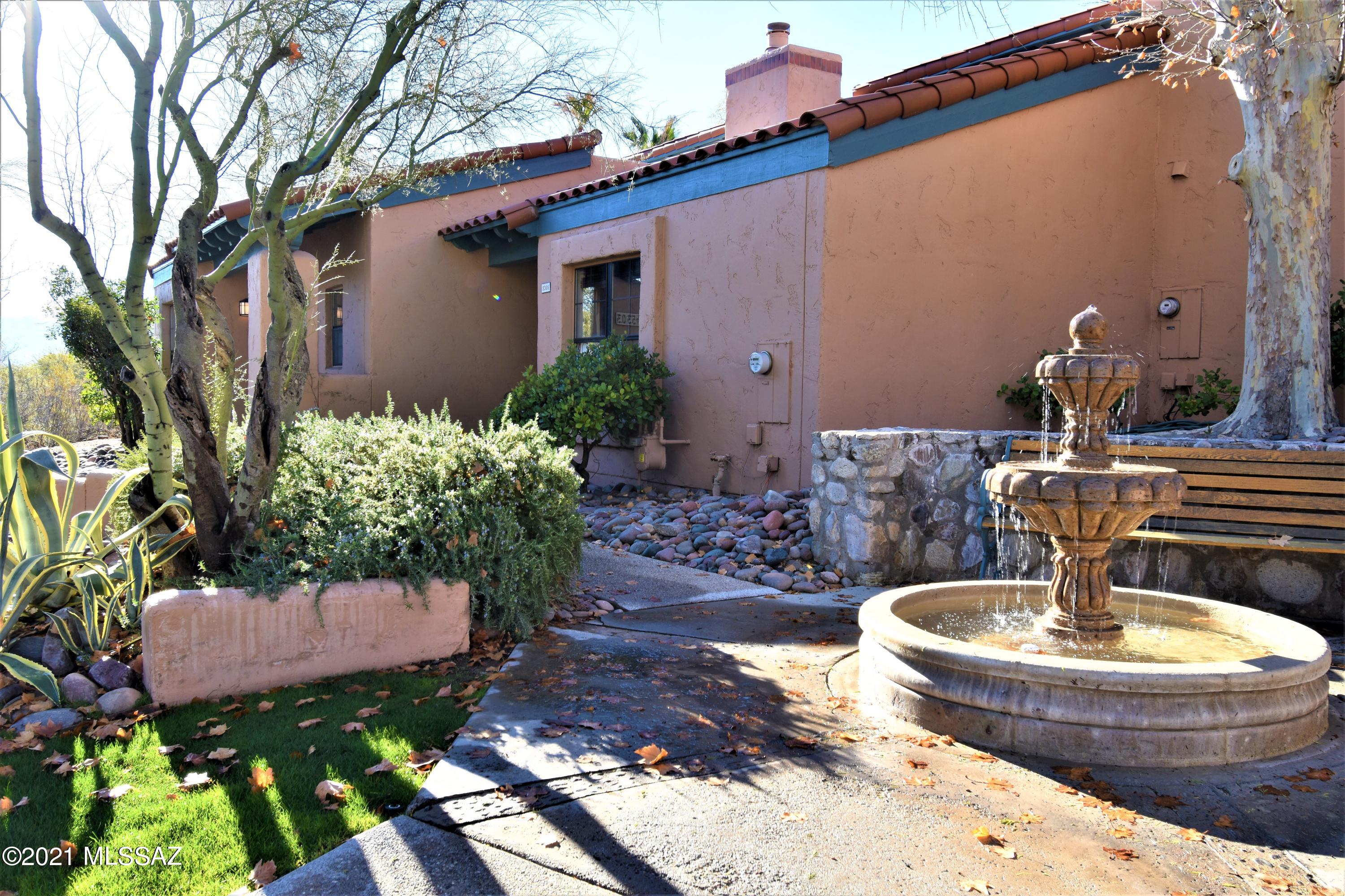 STUNNING FOOTHILLS TOWNHOUSE! Located in the extremely desirable Ventana De Sabino Villa. Enter this sought-after signal story and you notice the spacious and bright floorplan. Upgrades include all stainless appliances, NEW Counters, NEW Stove, NEW Dishwasher, NEW Kitchen Sink & Faucet, NEW Exhaust Hood, NEW Disposal, NEW Bath Counters, NEW Bath Sink & Faucet, and sealed Saltillo tile floors. Additional upgrades include a delightful fireplace, vaulted ceilings, ceiling fan, cozy covered patio and a spacious loft which is just perfect for a office or a storage area. This house enjoys a premium lot with no units in front.  The  community pool and spa is beautifully maintained. Very close to the renowned Sabino Canyon Recreation Area!