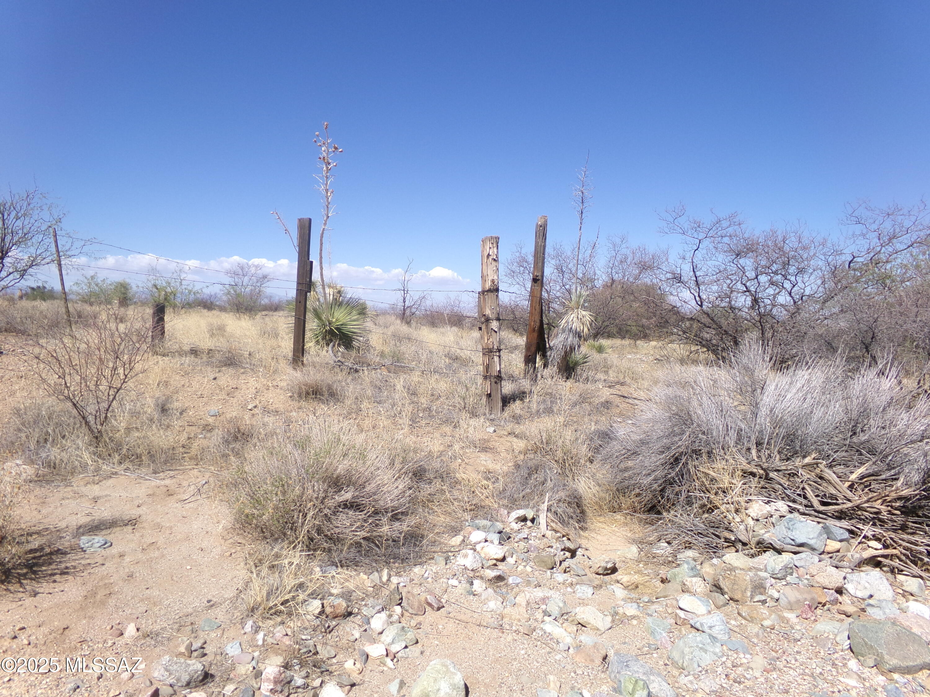 38.65 ac of fenced property just 4 miles from State Highway 186. Flat Land with rolling hills  
Scenic view of the Willcox Playa and Sulphur Springs Valley. Great place to build your dream home.  Lots of room to roam.
