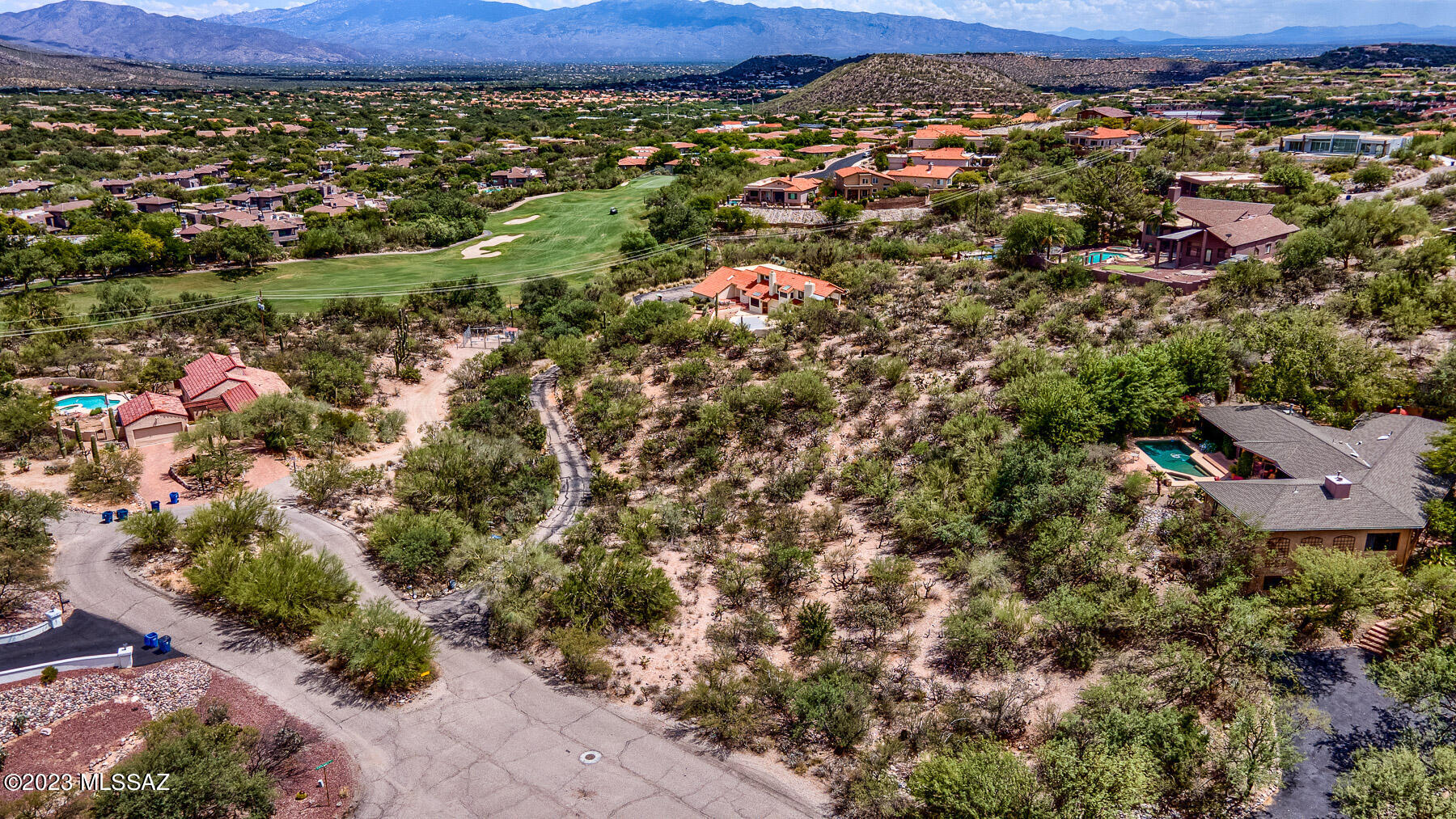 Almost a full acre of lush desert with sweeping Catalina Mountain Views! Hillside elevation and North/South orientation. Bring your plans and build your dream home. Recent survey attached in documents.