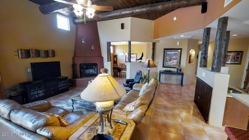 All communication and negotiation shall be conducted only through the Owner. Owner is licensed to sell real estate in Arizona. Available for June 1st Occupancy - Minimum lease 12 months, Immaculate 3BR/2BA great room plan in small enclave of TJ Bednar homes. Backyard has covered patio, extended pavers area, built-in BBQ, Kiva fireplace and views of those spectacular Catalina Mountains. Spacious kitchen has silestone counters, 42 inch cabinets and stainless steel appliances. Great room has wood beam ceilings and pillars. Split bedrooms -- master on one side and 2 more bedrooms plus a full bath on the other. Roomy 2-car garage equipped w/ cabinets for storage.