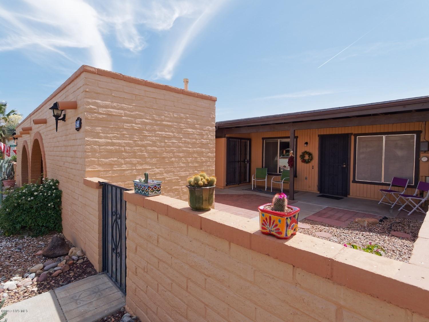 Great winter retreat or use full time. Beautiful porcelain tile thru out, newer dryer, roof recoat in 2015. Spotless, clean and ready for move in! Separate golfcart garage/workshop. Membership to GVR, pools(13), pickle ball, tennis, hundreds of Clubs & Classes. Seller is licensed Real Estate Agent in AZ.