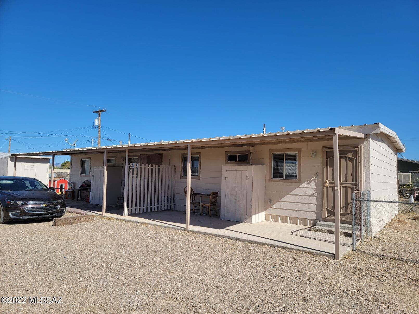 Duplex - This property has been completely remodelled and ready to earn you an income ! The units are mirror image and are 2 bedroom, 1 bath, with washer and dryer. Metal roof , new split a/c units.  Electric water heaters on porch in enclosed area for safety. Property is completely fenced with metal/chain link with gates and front and rear entrance. Utility shed included. Nice covered porch area and each unit has its own yard area. Units have a stove and refridgerator, and small island. Utilities are paid by tenants and units brings  $650 & $700 per month