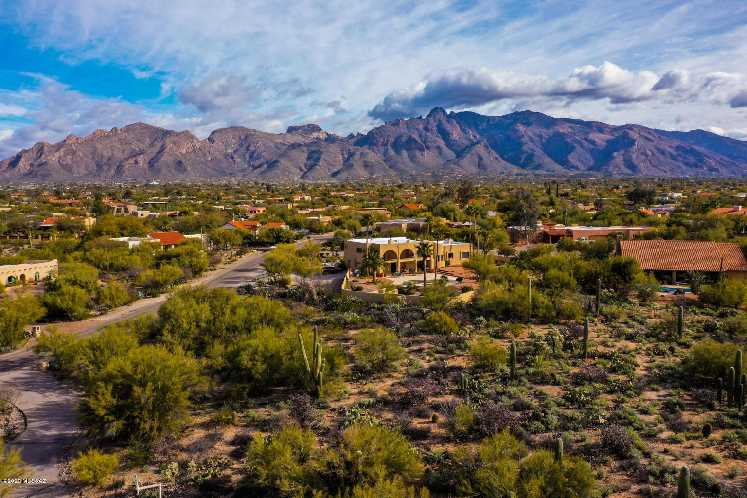 Flat and ready to build vacant land lot in the Catalina Foothills! Build your dream home on this parcel nestled in the desirable Shadow Hills subdivision, surrounded by natural desert landscapes and sweeping mountain/sunset views. This home site is conveniently located in the sought-out Catalina Foothills School District and near shopping malls, restaurants, hiking trails, and more! Current owner conducted a soil evaluation on 10/2017 (expired on 10/2018), report available upon request.