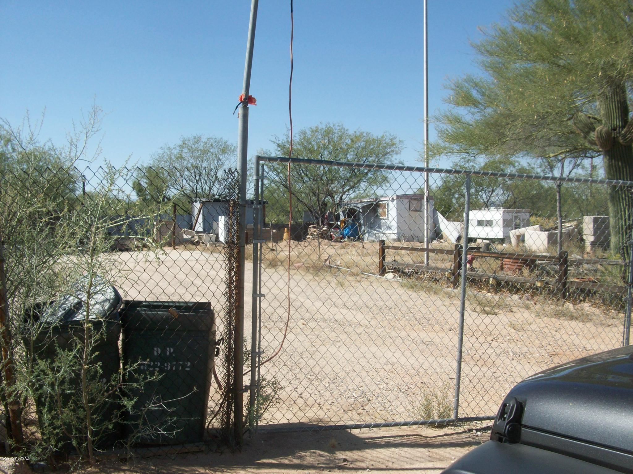 Level lot with partial fencing - utilities set up for mobile