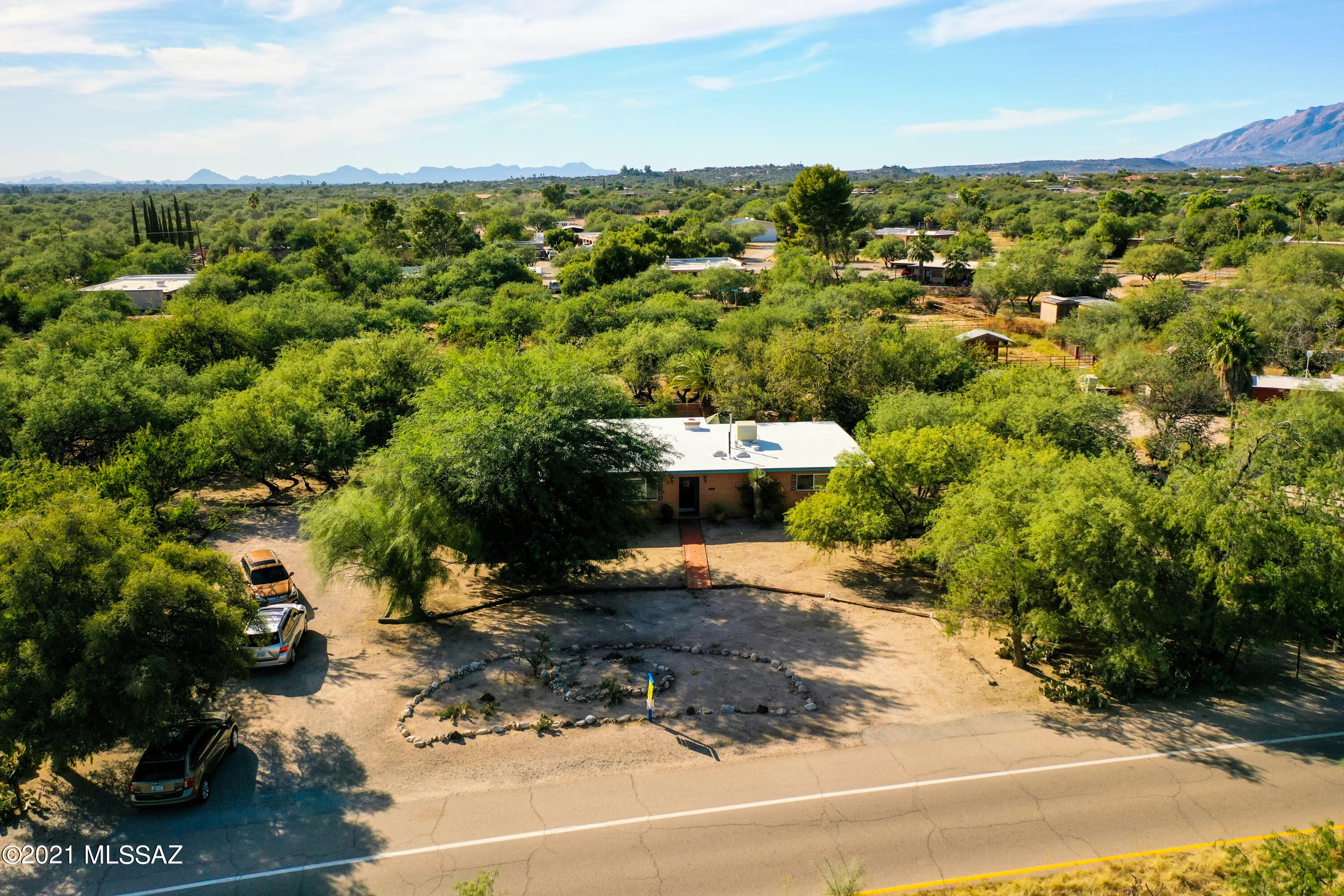 Secluded property in lush mesquite bosque. MCM floor plan with  mountain views.  Family room views sparkling pool and spa. New pool pump/filters/ hot tub equipment upgraded and refrigerator. Large circular drive with extra parking and room for an RV. Large corral. Raised irrigated gardens.
Plenty of room to play. Well prepared for sale.