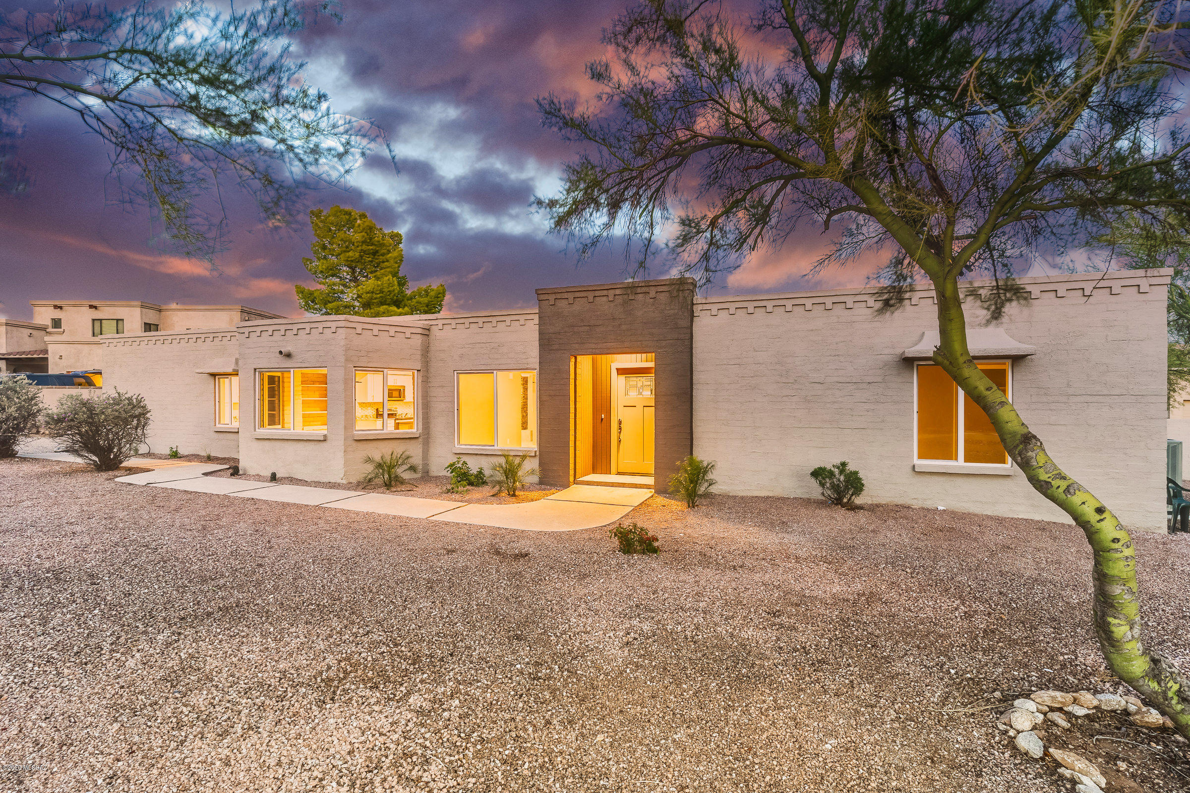 Range Priced~Seller will accept or counter offers between $450,000-$475,000. Spectacular remodeled foothills home nestled in to one of the nicest areas of the Catalina Foothills. This home has been lovingly restored and updated to better than new condition. Brand new re-conditioned pool and pool equipment, grass play area, spacious backyard perfect for entertaining and wonderful covered patio. You will enjoy 360 degree views of the mountains and city lights from the roof top deck. New roof and new windows. Open floor plan with all new kitchen with granite counter tops. Updated contemporary lighting.  Open floor plan with stacked stone fireplace, breakfast bar and a fantastic master suite. Seller is a licensed real estate broker in Arizona.
