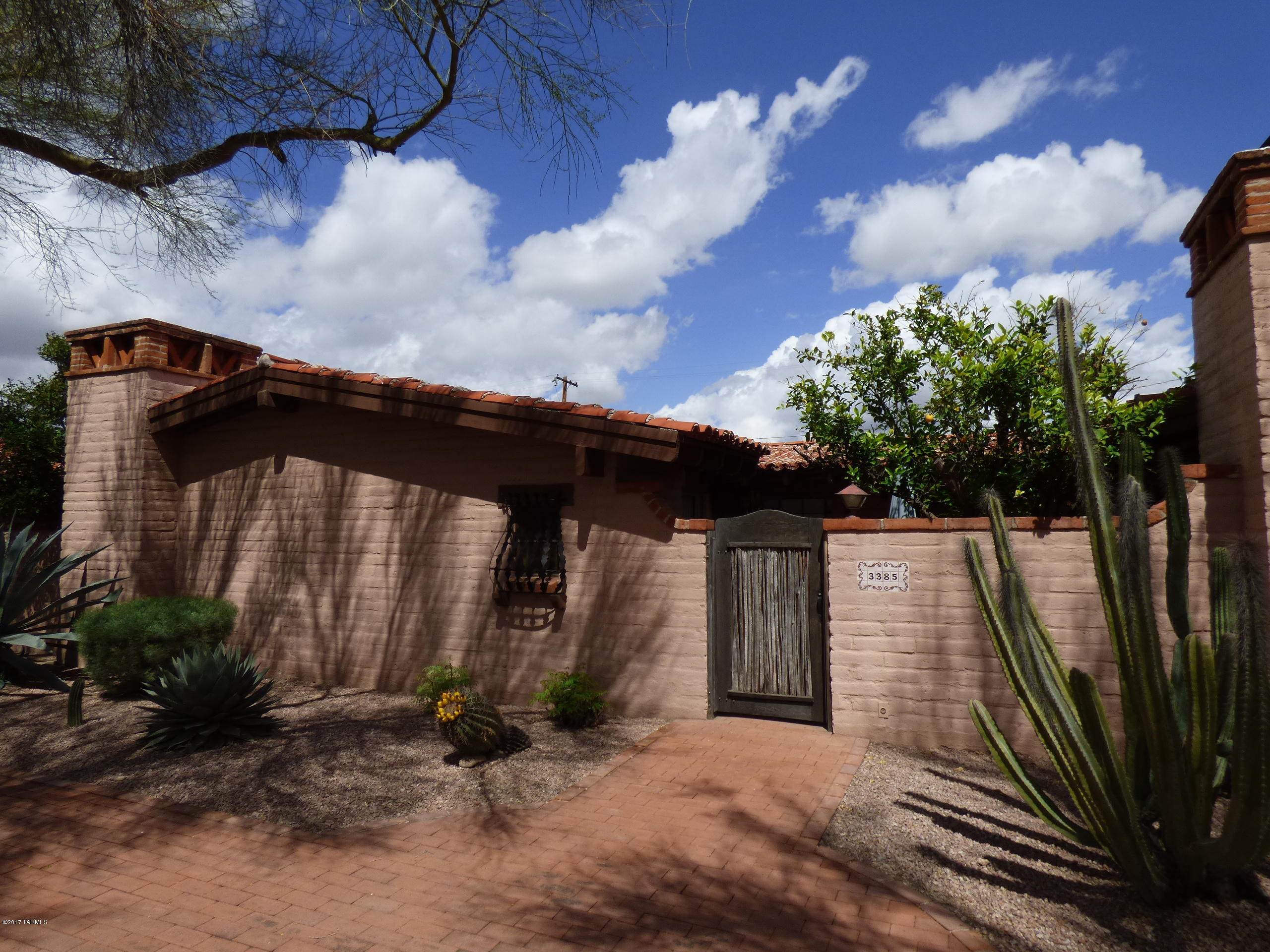 Feels like Tucson. Classic, charming southwestern style 1564 square foot, 2 bedroom, 2 bath townhouse in the central Miramonte Neighborhood. Very close to Whole Foods, Loft Theater, 3rd Street Bike Way. Efficient comfortable floorplan with an upgraded Master bath, new dishwasher, added laundry in the house, 2 carport spaces and a beautiful community pool. This Community, Villa De Jardin townhouses, does not allow rentals. This is a great opportunity.