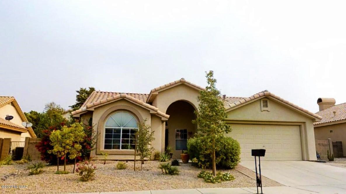 Located on a quiet cul-de-sac, this light-filled home welcomes you into a formal living and dining room with soaring vaulted ceilings. A functional kitchen opens to the breakfast nook and a cozy family room with kiva fireplace. A den with double doors is perfect for office space, a craft room or 3rd bedroom. Large master suite features wood flooring & ensuite bath with dual vanity, garden tub, separate shower & oversized walk-in closet. A multi-purpose bonus room to be used as you please. Newer HVAC unit, water heater and roof. Freshly painted inside & out. Newly built Arizona room is enhanced with tile flooring and opens to a private backyard with lush greenery and a large gazebo, perfect for gatherings. Front & back yards are freshly landscaped and all yard art will convey with the home!