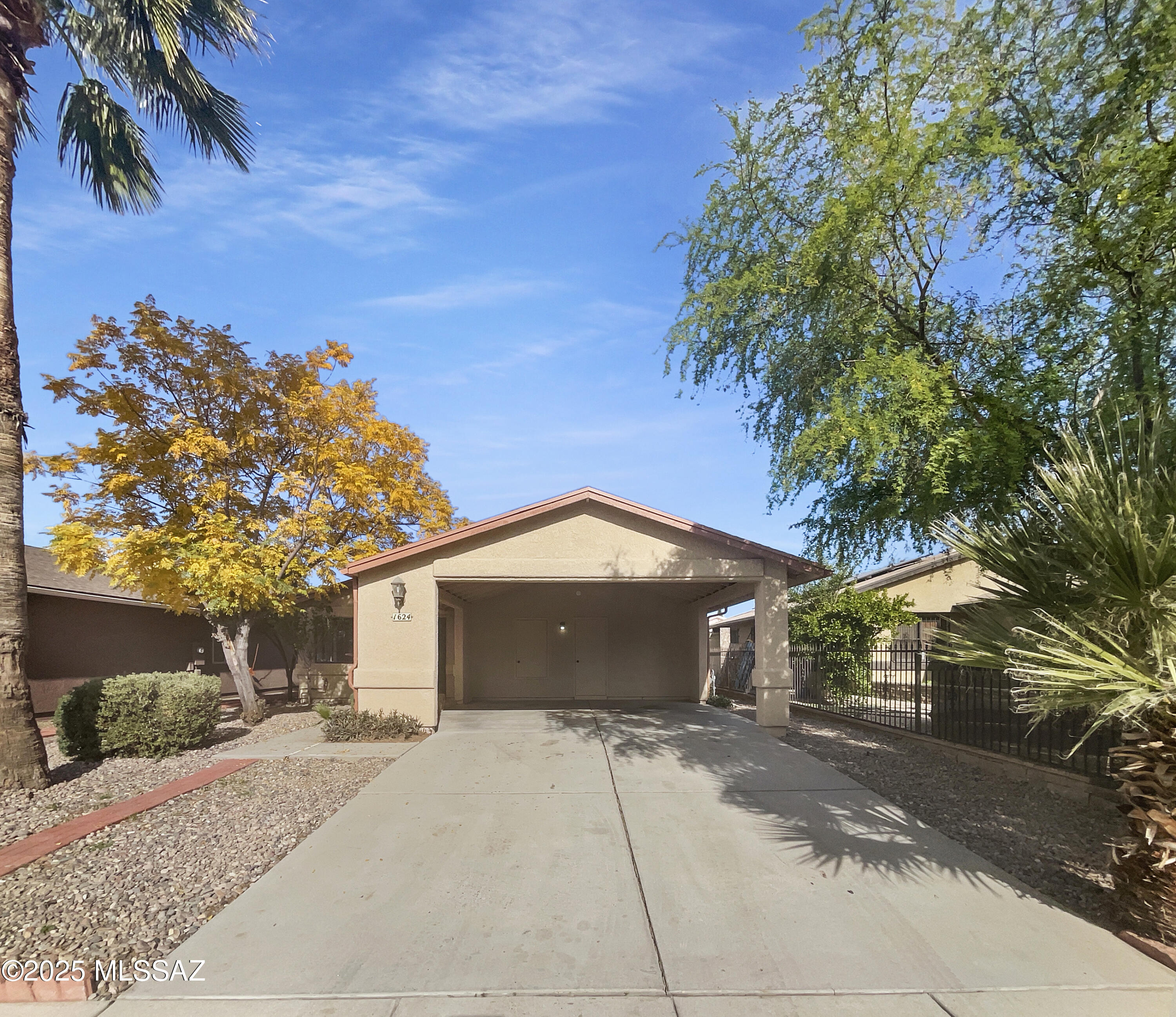 Welcome to 1624 W Mulholland Ct, a home that exudes charm and functionality. Lovely two bedroom home with a new AC unit! The kitchen provides an efficient layout for easy meal prep and everyday dining. A storage shed is included, providing ample space for your tools and outdoor equipment. Enjoy the covered patio, perfect for entertaining or simply relaxing. The fenced in backyard ensures privacy, ideal for peaceful outdoor living. Inside, fresh interior paint gives the home a clean, updated feel. This property is a perfect blend of comfort and convenience. Don't miss out on this gem! Included 100-Day Home Warranty with buyer activation