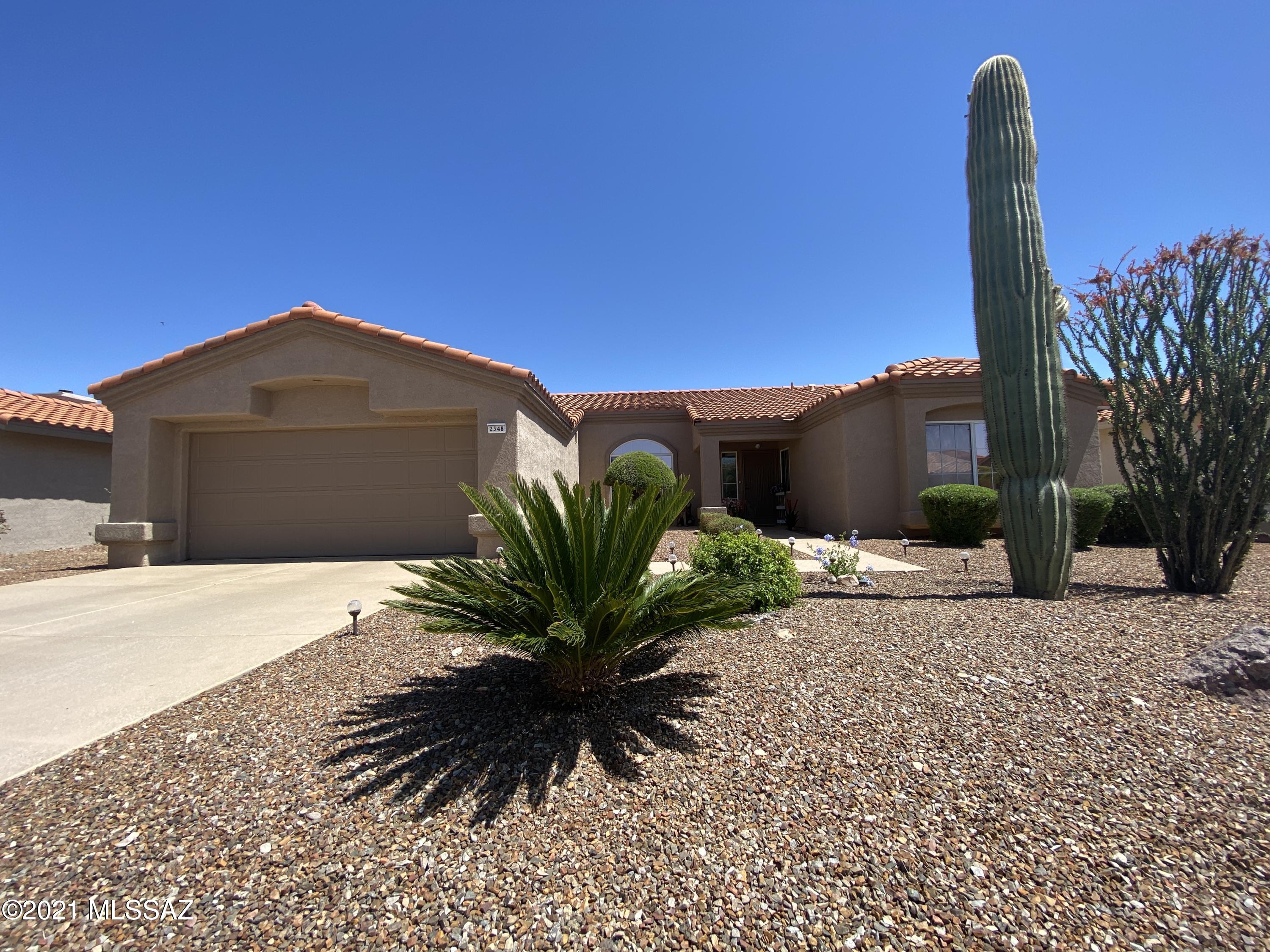 Welcome home and enjoy retirement living in this  beautiful house located in this active Sun City Community. Offering 2 bedrooms, 2 baths and an office/bonus room. This house has great looking laminate flooring, amazing looking kitchen cabinets, countertops and backsplash. Relax while enjoying the breath taking mountain views. Enjoy a great getaway in your very own backyard complete with pavers, beautiful low maintenance landscaping and an end to end pergola that offers great shade. Great epoxy flooring on driveway, front walk way, garage and back patio area. This house is in spectacular move-in ready conditions, pride of ownership is evident in this very well taken care of/maintained house. This is a must see gem, make this gem your next home.