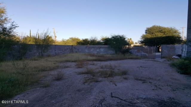 Location! Location! Location! Prime lot located near U of A, Banner Hospital, shopping & bus lines.  This approximately .33 acre lot is Zoned C-2 which allows for multiple uses.  (Please see zoning information under documents tab.) Frontage is approximately 60' and the lot is approximately 240' deep. Lot is enclosed with a block wall fence. Utilities are at the lot line. Great investment!