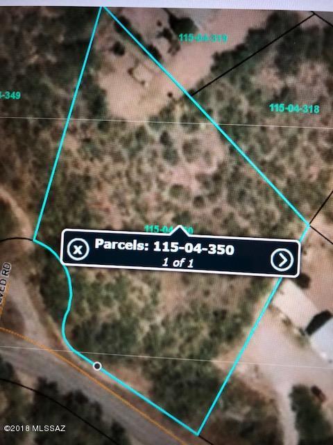 Great views surrounding this 1.17 acres of land on west side of Rio Rico. Build your dream home and enjoy all the beautiful views!