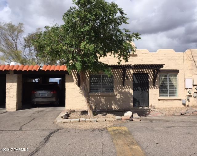 Great starter home.  2 bd/1 ba townhome features new flooring in the kitchen with a great open floor plan.  Updated full bath and new window treatments.  ALL APPLIANCES STAY!!  Great backyard with awesome views.  Schedule your showing today!