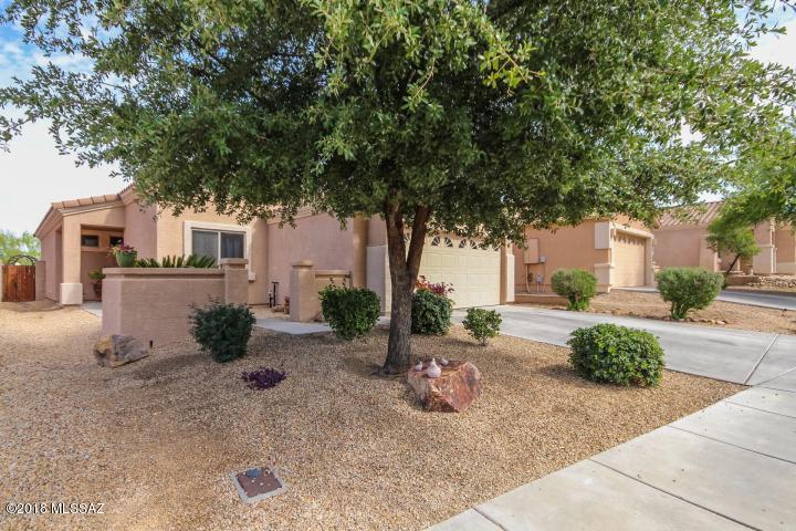 Your search is over! Welcoming open floor plan with the perfect neutral color palette for easy personal design! Cook like a pro in the upgraded kitchen with custom cabinetry, granite counters, pantry, and white appliances. Three spacious bedrooms have plush carpeting and ceiling fans. Master includes a walk in closet and an adjoining bath. Enjoy the abundant Arizona sunshine in the serene backyard! This home is sure to go quick! See it today and start packing!