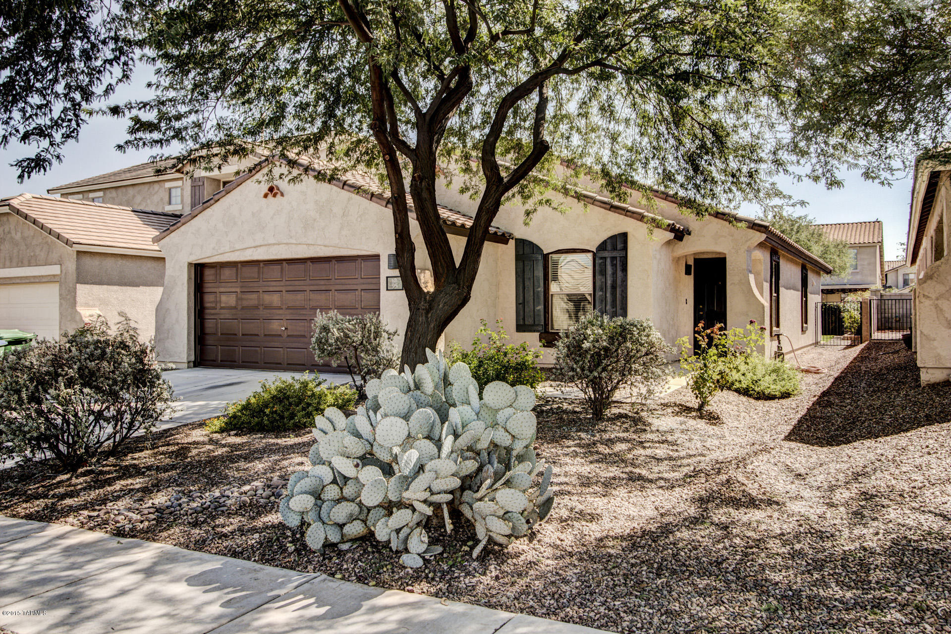 Come and see the resort lifestyle this community offers. Come see why everyone loves this floor plan built by Pulte. This beauty is in great and move-in-ready condition and it offers 4 full bedrooms, 2 full baths, a large size family room that connects to the spacious kitchen. This beauty offers wood laminated flooring in all common areas, clean carpets in all bedrooms. The backyard offers synthetic green grass, mature vegetation, a covered patio and no immediate neighbors and it's conveniently located within walking distance to the parks, walking trails, lake and other amenities.