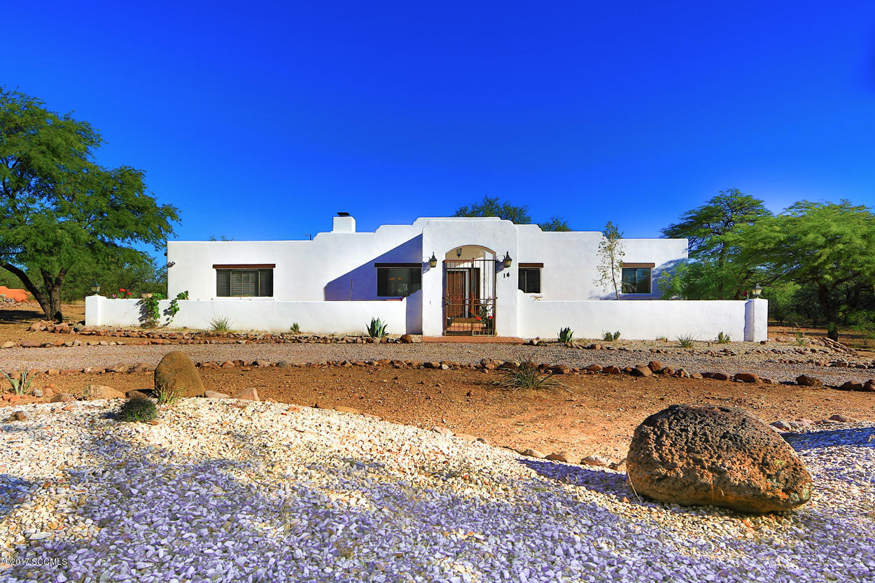 This home was completely renovated in apprx 2005 resulting in a spacious, modern, 4 bedroom, 3 and a half bath home on 1.43 acres. The new kitchen features a big island which is open to the great room and connected to a large rear courtyard with mountain views.The Master suite is roomy and luxurious. There is a bonus room with a half bath that could be a studio ,gym, office, or? Oversized 2.5 car garage has third door for 4x4, golf cart, or motorcycle. There is a private well for landscaping, vegetable garden. or pool.