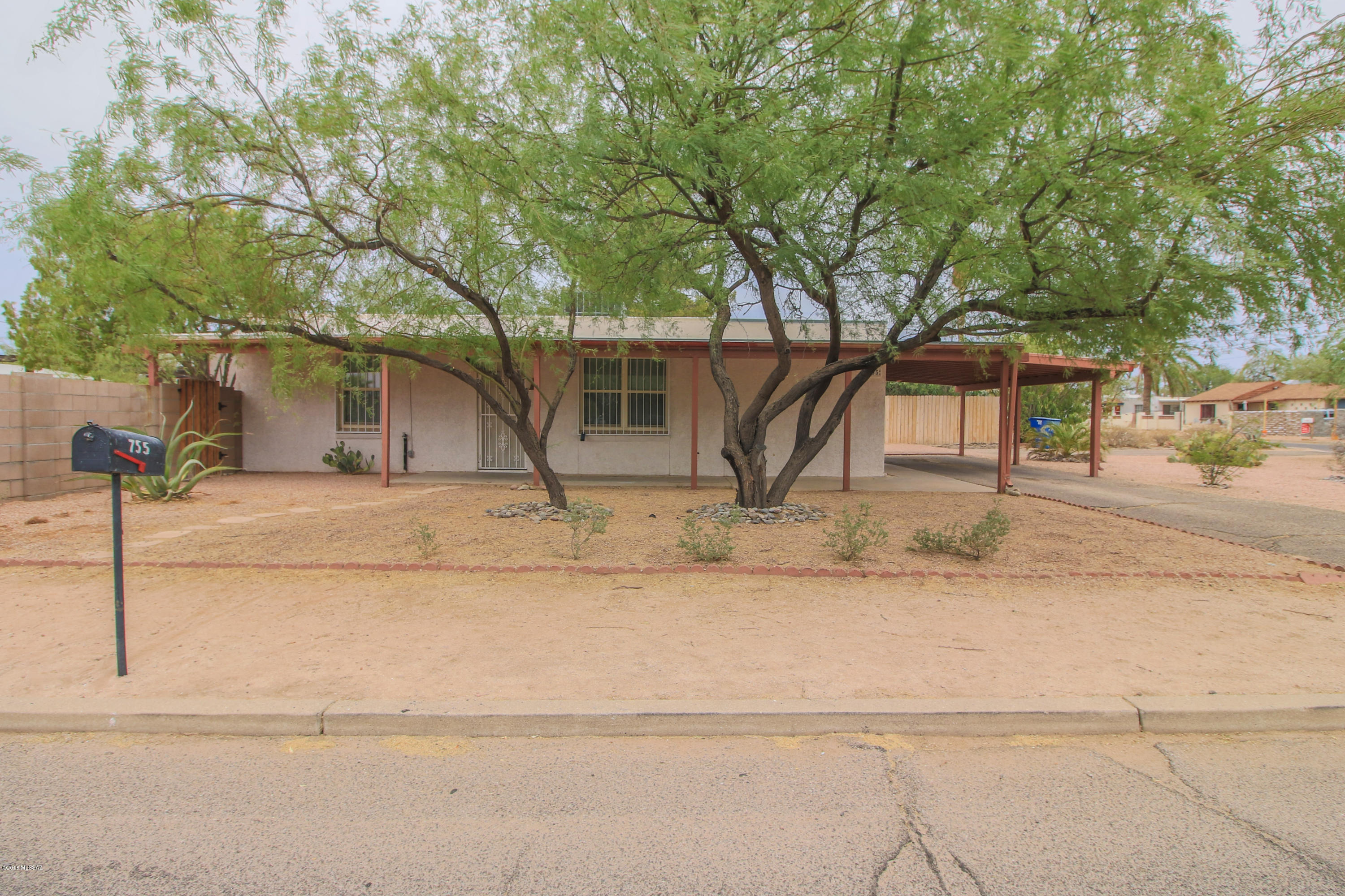 Super cute house in the central part of Tucson. This home features an updated kitchen with Corian counter tops, new cabinets, new interior paint, ceiling fans, skylights, newer HVAC system (2010), new roof (2016), wood blinds, newer dual pane windows, updated bathroom with tile surrounds, good sized laundry rooms, newer exterior doors, lots of ceramic tile and more. Exterior features include an updated electrical panel, front covered patio, low care backyard with an uncovered slab, RV space available, 1 carport, N/S exposure, security doors and more. Super close to Reid Park, shopping and more. Come see this home and call it yours.
