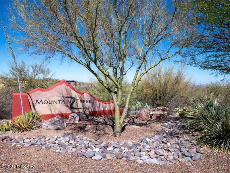 Situated in a small enclave of beautiful homes in Mountain Creek located in the Rincon
Valley Foothills. Lot size is approximately 2.47 acres. This gorgeous lot is slightly elevated with amazing views of 6 or
more mountain ranges. Buy now and build later. 25 minutes to major employers. With the new bridge over Pantano Wash travel is so 
 convenient. Have to See to Believe the value here!