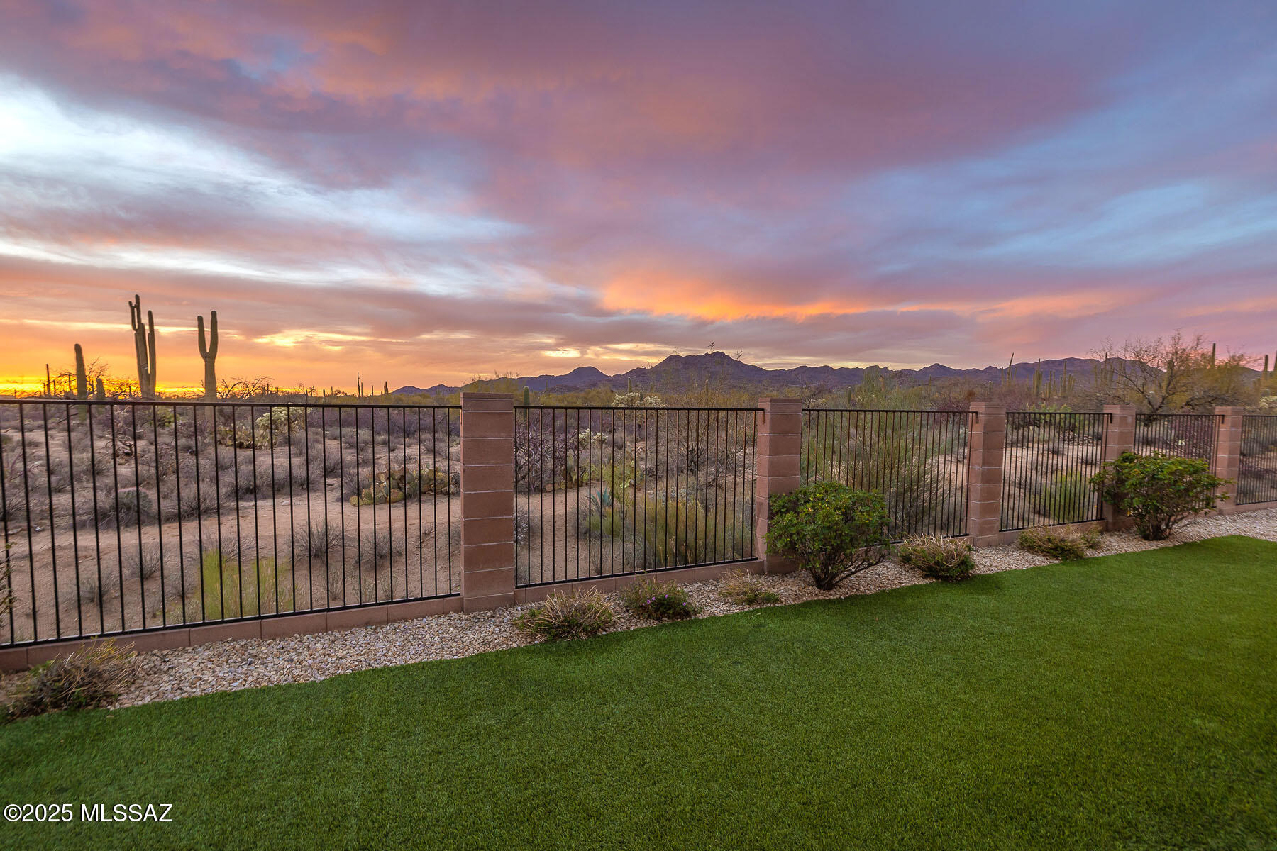 Drastic Price Reduction!!! Wonderful updated 4BR/2.5BA  home offering unobstructive views of the Tortolita Mountains and Unparalleled privacy. Truly one of the best lots in the NW abutting acres of natural desert owned by the HOA and the State. Picturesque windows with views from most rooms. Very spacious great room. Gourmet island kitchen with pecan cabinetry, SS appliances & granite counters. Beautiful ceramic tile flooring throughout. Updated HVAC systems (new in 2023 and 2024). Private court yard and large rear covered patio with colored concrete floors. The private rear yard borders acres of natural desert offering privacy & amazing views! Open buffer on 2 areas of this wonderful home.  See attached document for $44,000 in recent upgrades! Roof serviced by Hallmark Roofing.