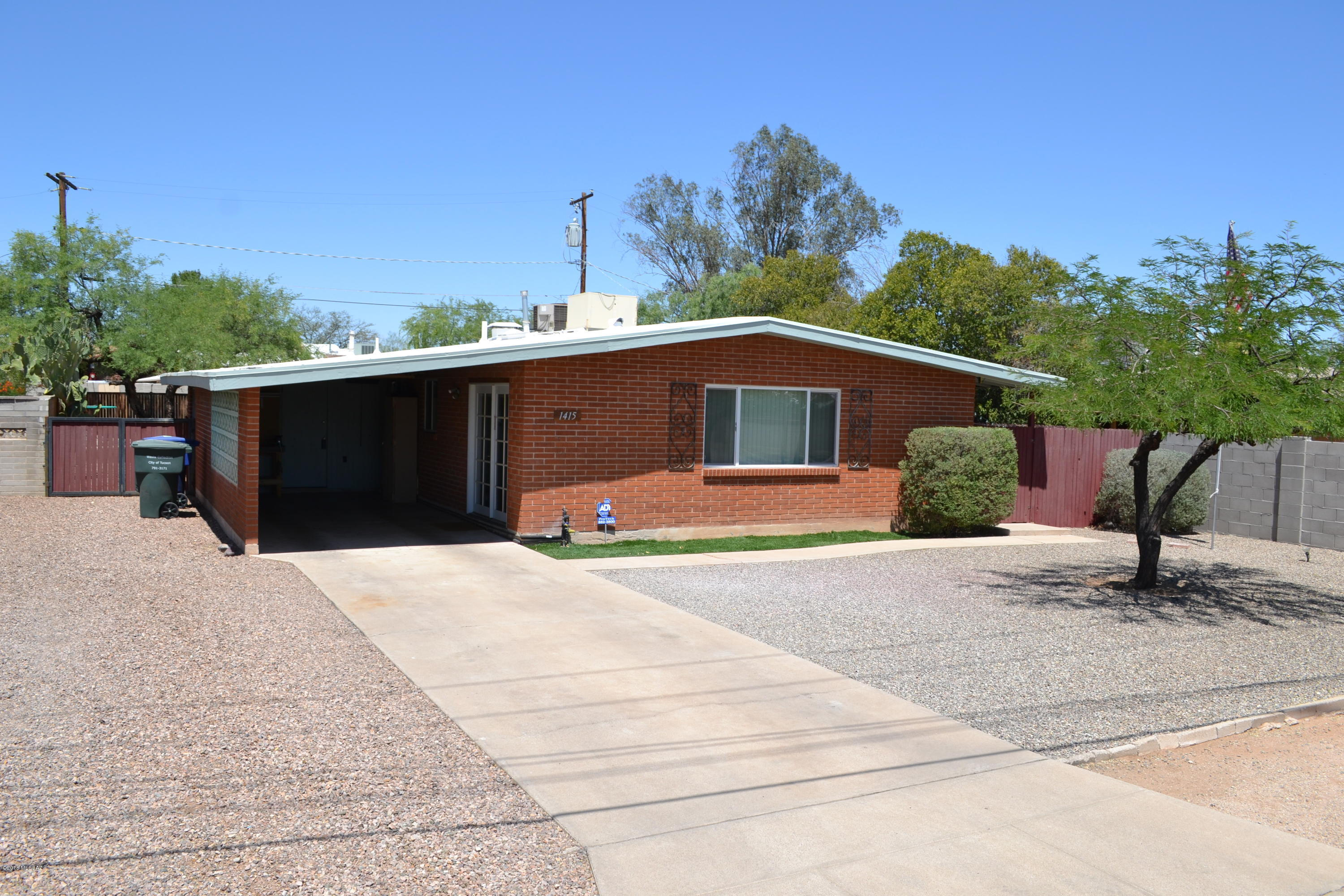 Beautiful midtown Bahia Estates gem, 2 bedroom 1 bath next to Pinecrest Park.  Wire cut red brick construction. Home features Vaulted ceilings, duel pane windows, Updated kitchen with quartz countertops, french doors, ceramic tile in living area, and wood floors in bedrooms.  Dual cooling AC, And evaporative cooling, forced air heat. This home also features paved driveway and carport, low care landscaping with Koi pond water feature.