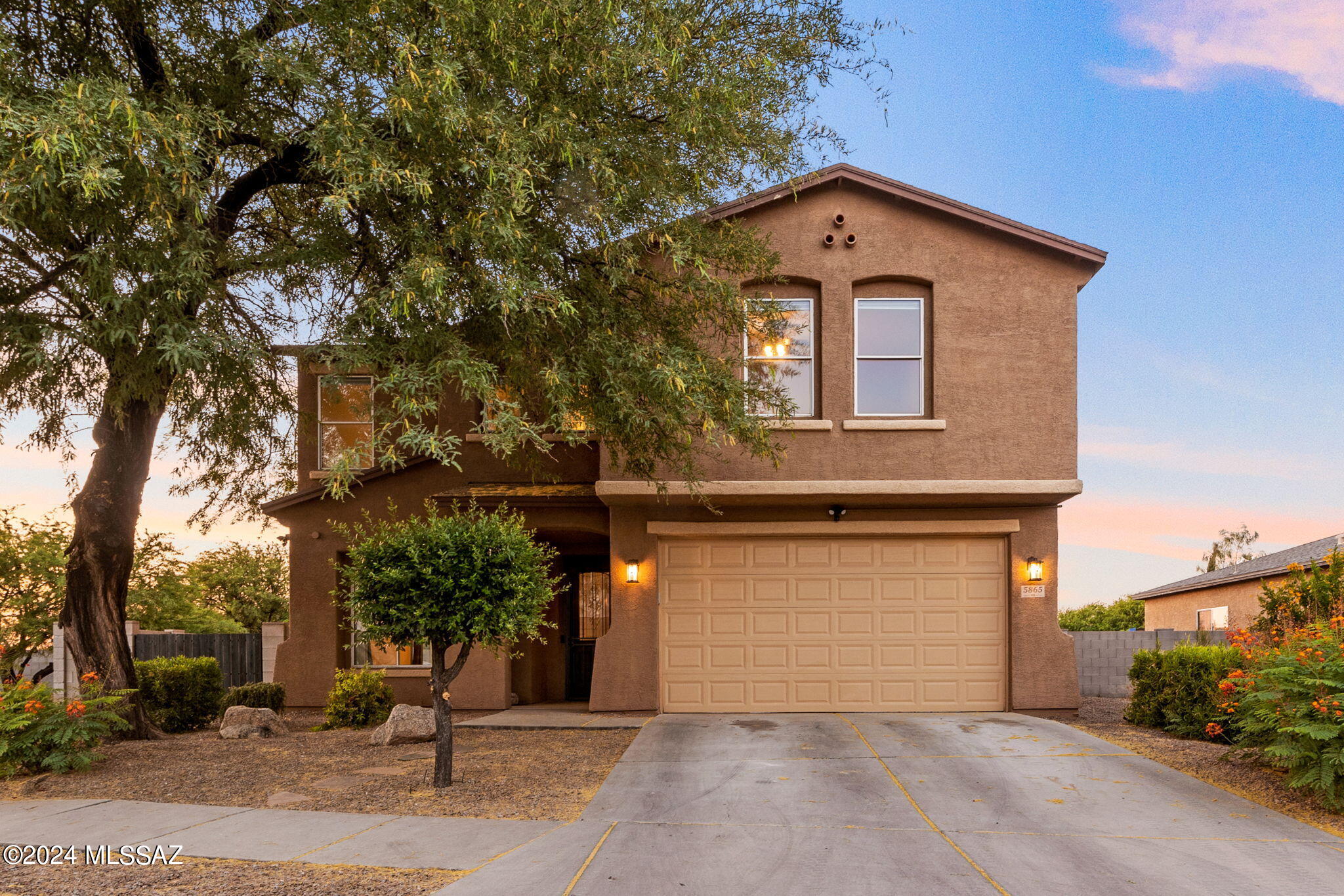 If space is what you need, this is the place for you! A generous corner lot with a dual gate entry to the large back yard of this 4 bed, 3 bath home! The primary suite provides enough space for a sitting area while the guest rooms are more spacious than most you find.  A wash to the rear and a common area to the west provides some separation to neighbors. The upstairs loft was converted to a bonus room that provides a private play area, office space or hobby room.  A new roof, water heater and exterior paint were completed in 2021, while updated cabinets, butcher block countertops, new appliances and new paint on the 1st floor all completed May 2024! The HVAC system has been serviced to be ready for summer and this home is located within 15 mins to the UofA and downtown!