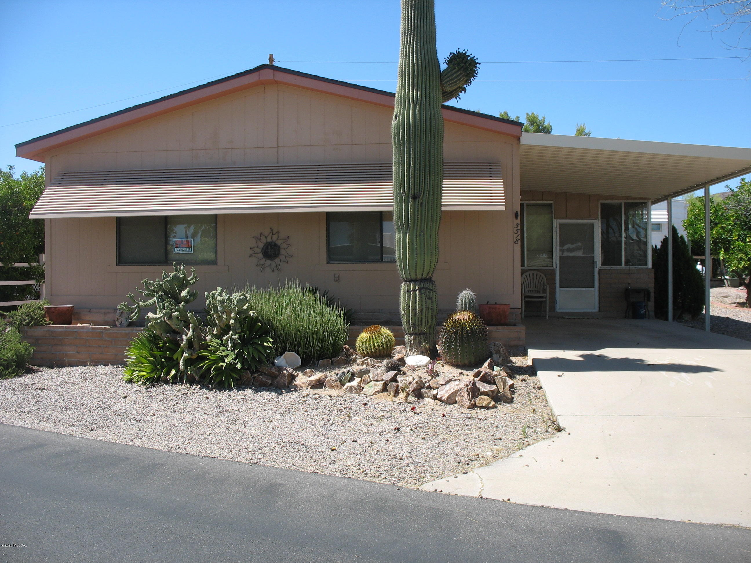 Very nice completely furnished 1988 Schultz 2 bedroom 2 bath manufactured home ready for you to move in!  All laminate flooring throughout home.  Arizona room has an additional 278 square feet of usable space.  Shingled roof replaced in 2015.  Complete house painted and caulked in 2013.  Plumbing replaced in 2003 with PVC.  New Trane AC unit and furnace in 2016.  Wide hallway leads to the bedrooms.  Master bedroom includes a large walk-in closet.  Golf cart included!  Don't miss this one!  Many other improvements, too many to list.  The HOA fee includes unlimited golf, tennis, pickle ball, shuffleboard, 3 pools, spa, exercise room, trash collection, and a lot more.  You own the land!