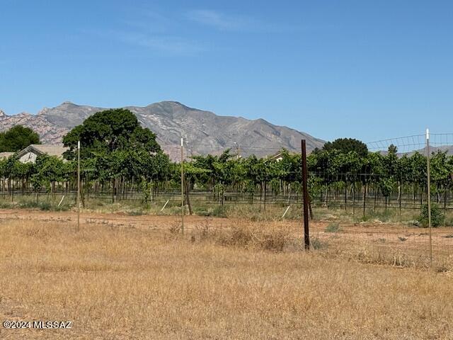 In town Sunsites lot. Good mountain views. Water and sewer available through water company. Backs up to the Vineyard. Frame built homes only. No HOA. Utilities at the street side.