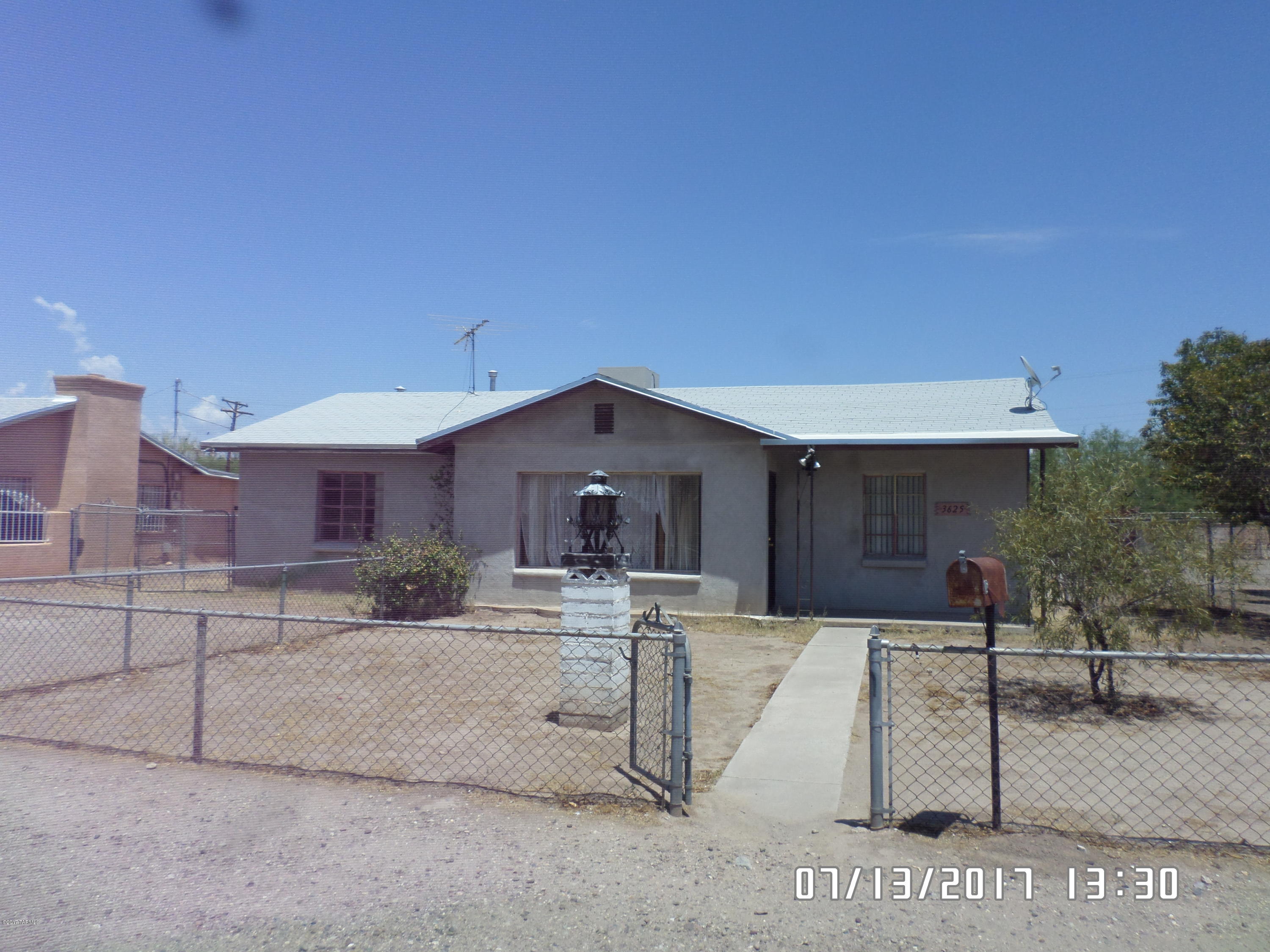This is a large 2BR/1BA House located in the SW area of Tucson, right next to Kennedy Park! There is a large fenced in backyard with a storage shed and a full length covered patio! There is a half bathroom in one of the bedrooms and the other bedroom has a HUGE Closet.