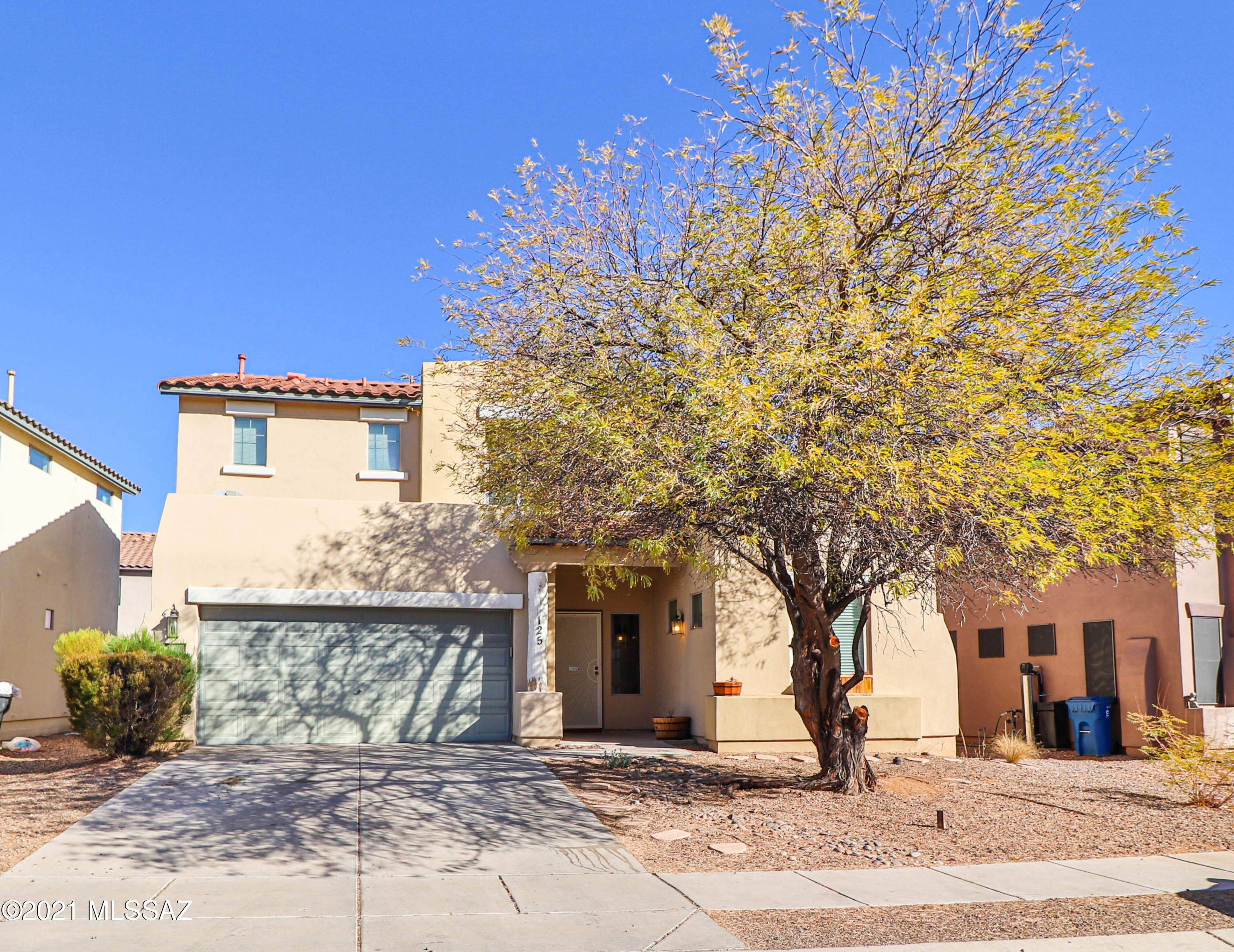 Popular Pulte Homes Cordoba Floor plan in Rancho Sahuarita!   The 1576 SF home features 2 Beds and 3 baths with a den/office on the lower level! Spacious primary suite with big walk in closet and dual sinks!  Junior suite on second level as well with its own private bathroom!  Laundry conveniently located on second floor with washer and dryer included!  Mostly tile on ground floor with the exception of the den!  Great room features 20 foot ceilings!  Nice sized kitchen features upgraded toffee maple cabinets with pullouts!  All kitchen appliances come with the sale including the fridge!  Extended paver patio in back yard for those outdoor family gatherings!  Community has all the amenities you could imagine including clubhouse, waterpark, lake, pools and more. Schedule your showing today!