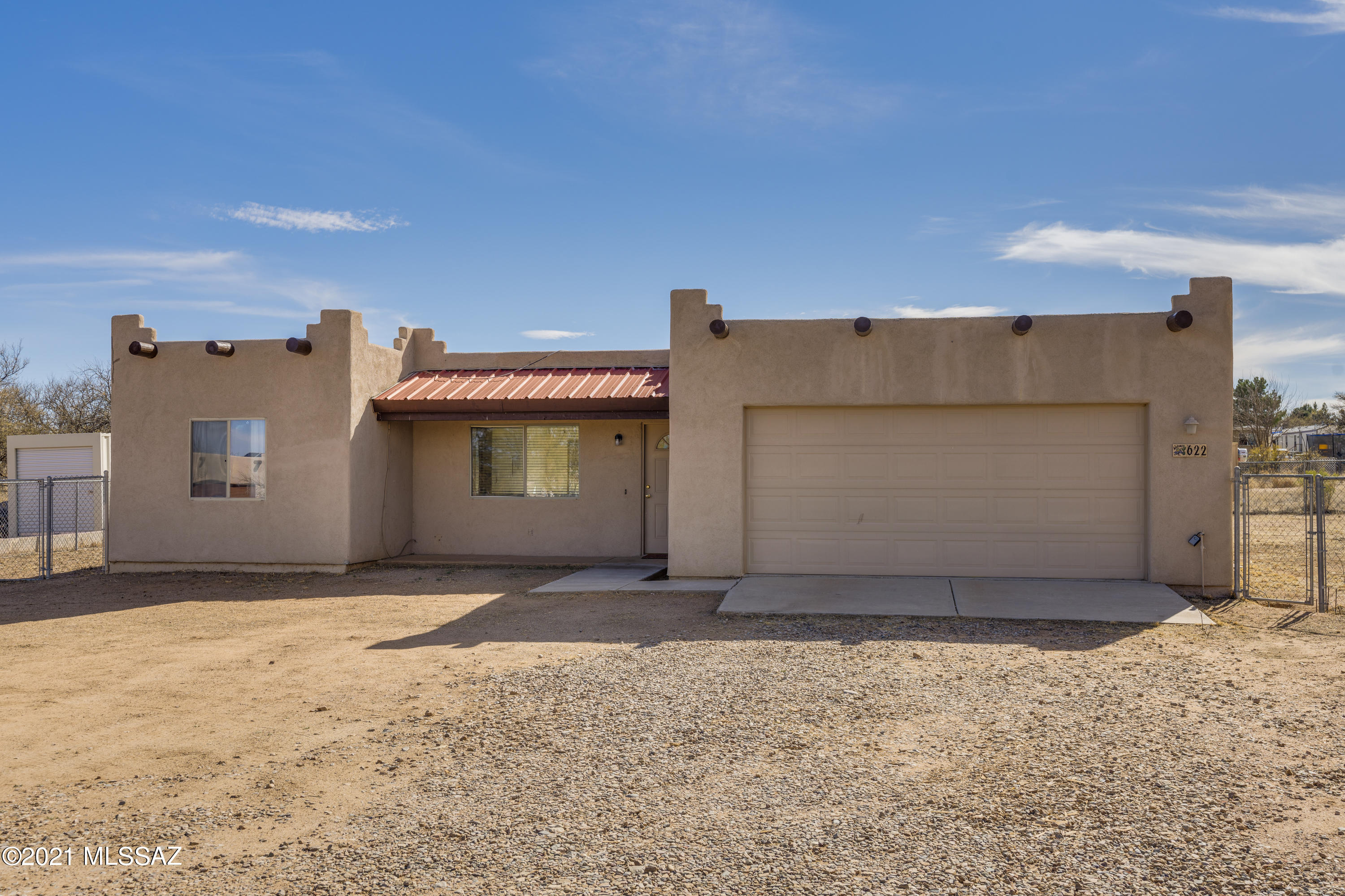 Sellers will accept/counter offers between $151,500 and $166,500.  Terrific 3 Bed/ 2 Bath southwestern home on a large lot ready for new owners. This 2005 home has tile in all areas except the 3 bedrooms which are nicely appointed with a neutral carpet.  Kitchen has a sizeable breakfast bar, spacious cabinets, all appliances and a picture window overlooking  the serene backyard. Bathrooms are lovely and have tile surrounds in the showers/baths.  Counters are also tiled for a custom look.  Master Bedroom has a supreme walk-in Closet and all bedrooms have ceiling fans.  This house has a GORGEOUS mountain view from the front porch area with plenty of room out front to create a beautiful courtyard if so desired.  Close to I-10 for easy commuting to Tucson or Sierra Vista. Come make this Home!