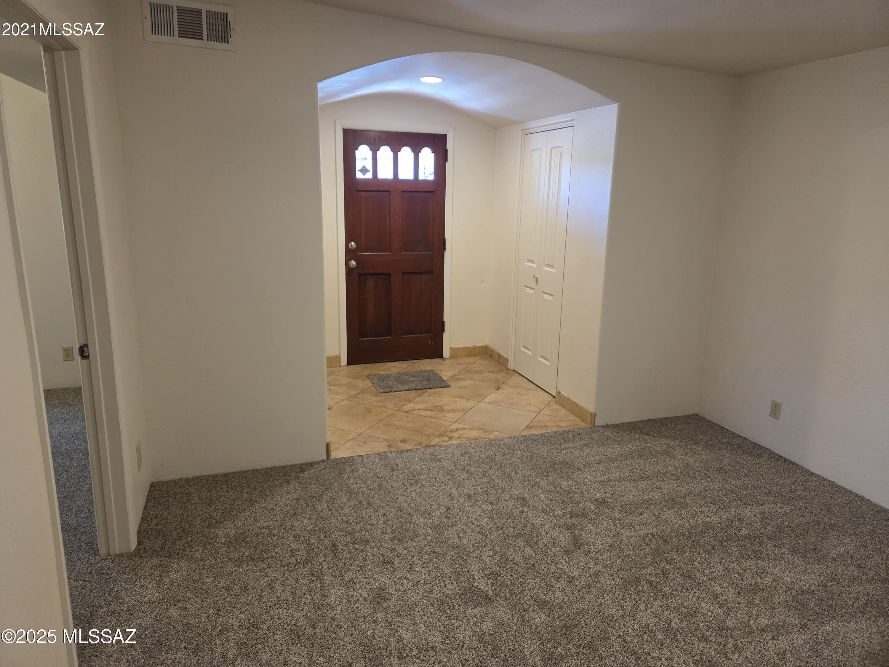 Live where you work, work where you live!  An attached modern 2 bedroom, 2 bath home is included with this unique Midtown Mixed Use /Industrial (Pima County MU) Zoned Home/Office / Warehouse Building. Features include a large showroom/reception area with wet bar, adjacent separate work area and heated and cooled 2 car garage / workshop. This is a rare opportunity to own Residential/Commercial/Industrial Zoned property in this small Pima County pocket, at the base of the Catalina Foothills. No City Sales Tax!