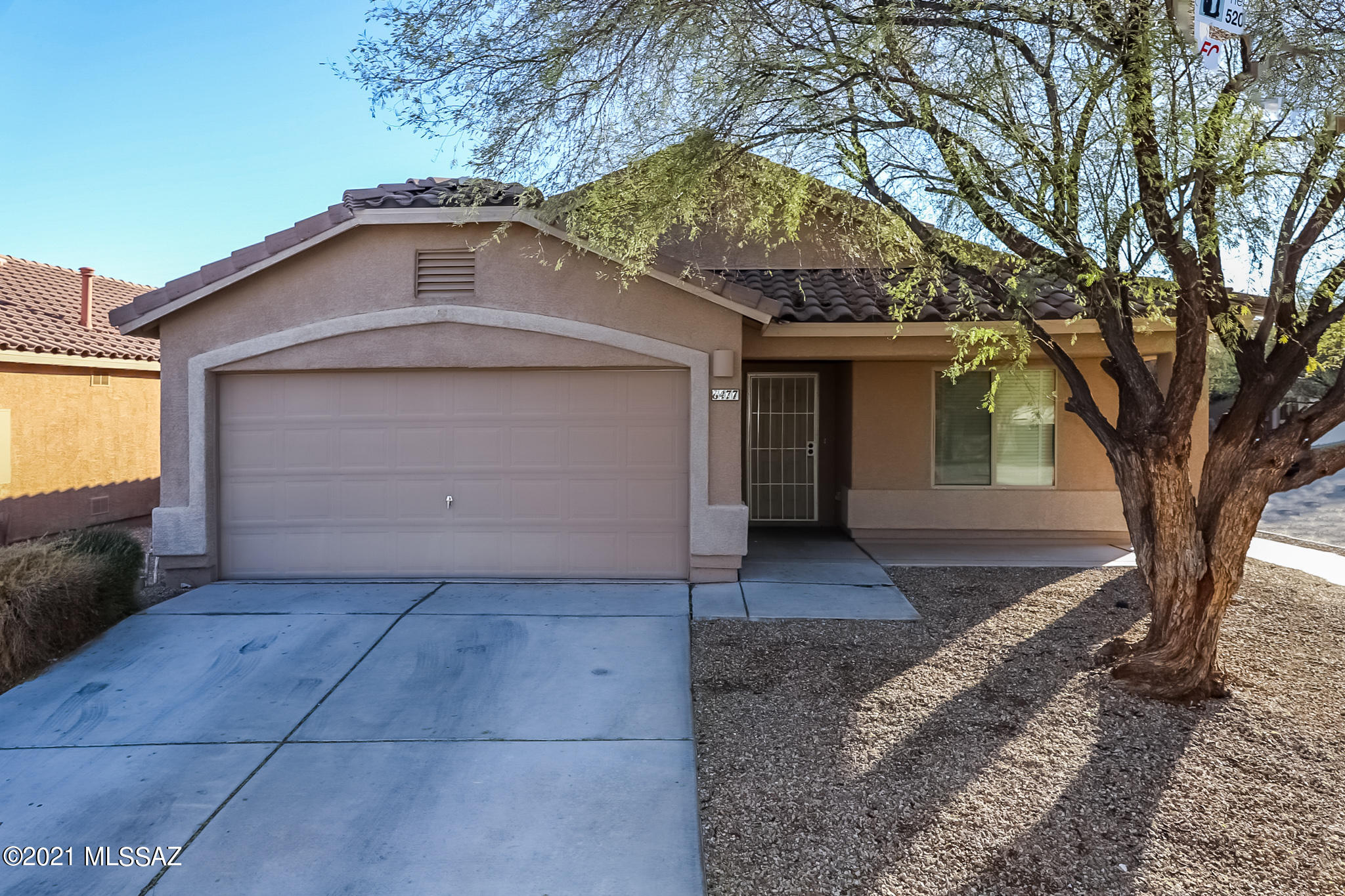 Charming 3 bed, 2 bath corner lot home located in the highly sought after Vail School District. The freshly painted home offers an open floor plan and a kitchen island with bar seating. Both the front and rear landscaping has been updated with new gravel. Come relax next to the fire pit in the large rear yard. Enjoy the private parks, dog park and community pool. Conveniently located close to shopping centers. Must qualify for Solar Lease-to-Own. Call and schedule your viewing appointment today!